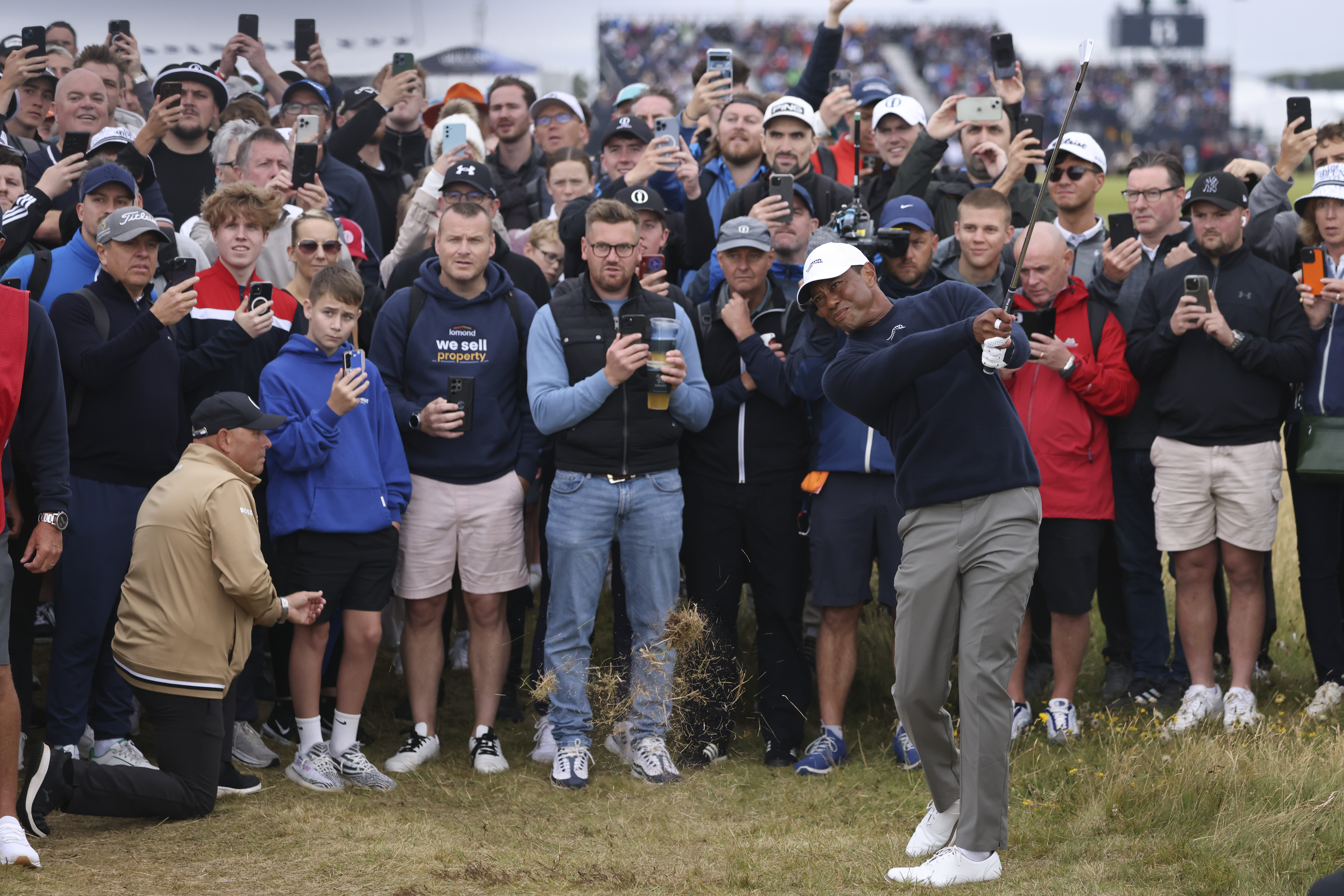 Tiger Woods of the United States plays from the rough on the sixth hole during his second round of the British Open Golf Championships at Royal Troon golf club in Troon, Scotland, Friday, July 19, 2024. (AP Photo/Peter Morrison)