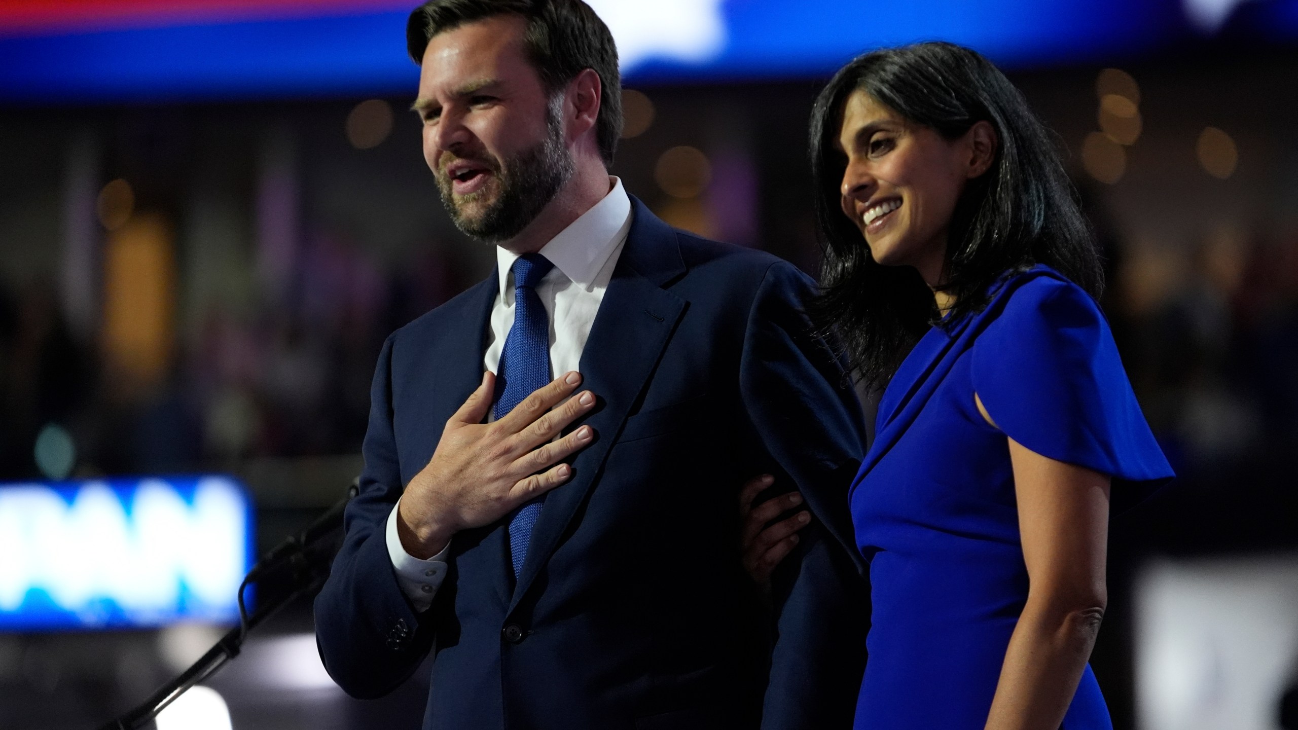 Vice Presidential Nominee Sen. JD Vance and wife Usha Chilukuri Vance acknowledge the crowd during the Republican National Convention Wednesday, July 17, 2024, in Milwaukee. (AP Photo/Paul Sancya)