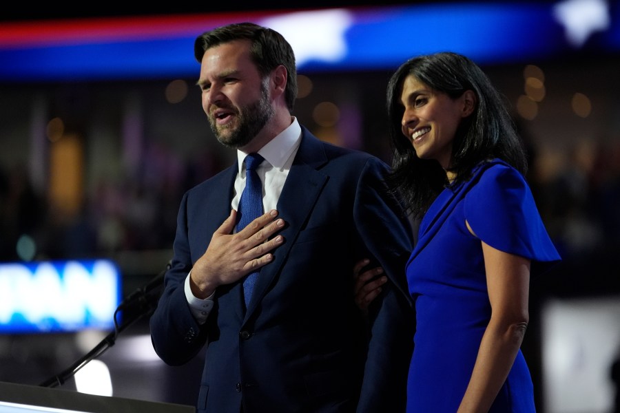 Vice Presidential Nominee Sen. JD Vance and wife Usha Chilukuri Vance acknowledge the crowd during the Republican National Convention Wednesday, July 17, 2024, in Milwaukee. (AP Photo/Paul Sancya)