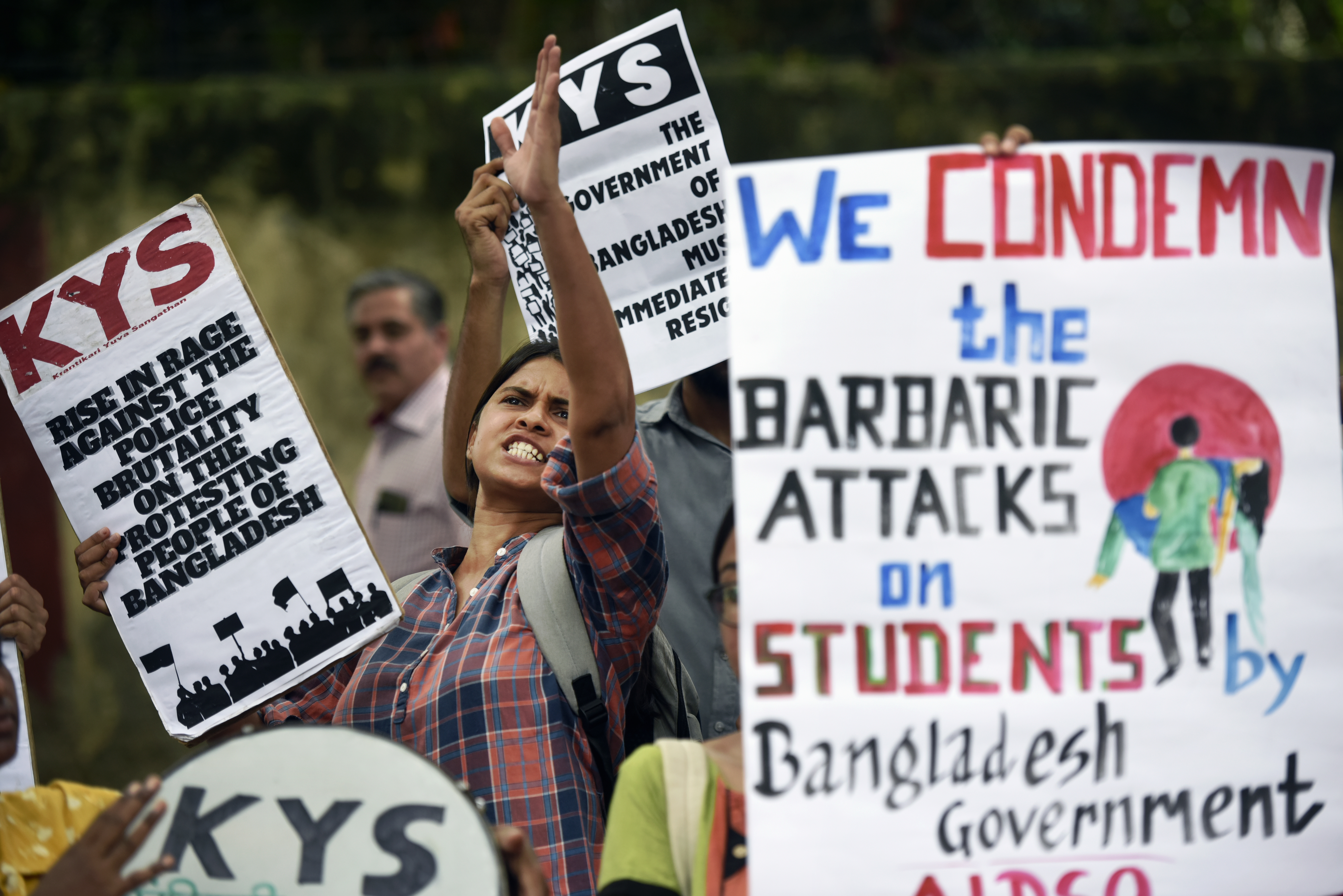 Activists of All India Democratic Students' Organisation (AIDSO) shout slogans in solidarity with protesting students in Bangladesh, at a protest gathering in New Delhi, India, Friday, July 19, 2024. (AP Photo)