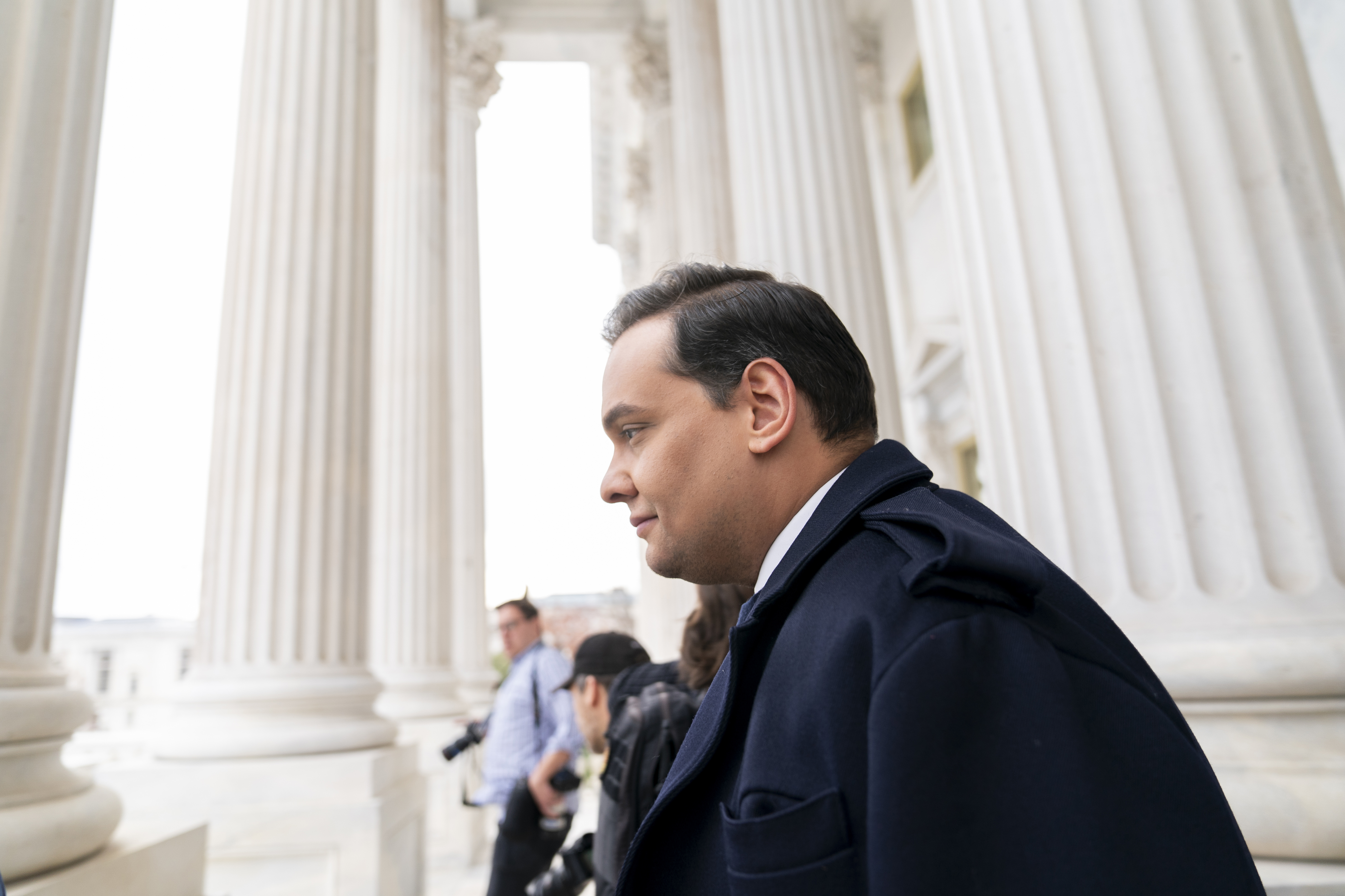 FILE - Rep. George Santos, R-N.Y., leaves the Capitol after being expelled from the House of Representatives, Dec. 1, 2023, in Washington. (AP Photo/Stephanie Scarbrough, File)