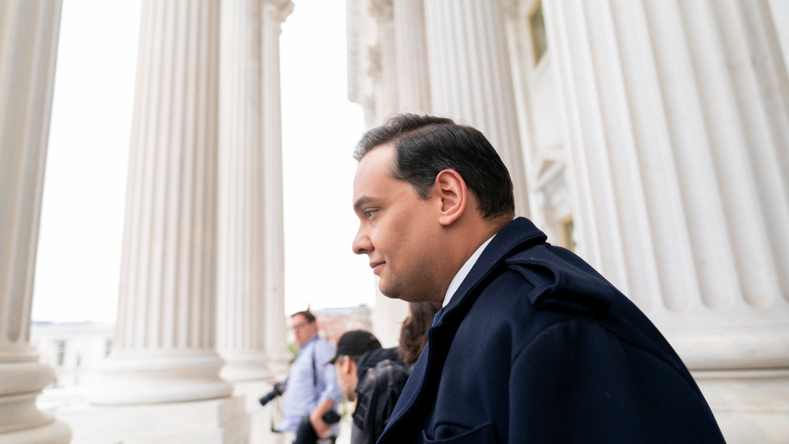 FILE - Rep. George Santos, R-N.Y., leaves the Capitol after being expelled from the House of Representatives, Dec. 1, 2023, in Washington. (AP Photo/Stephanie Scarbrough, File)