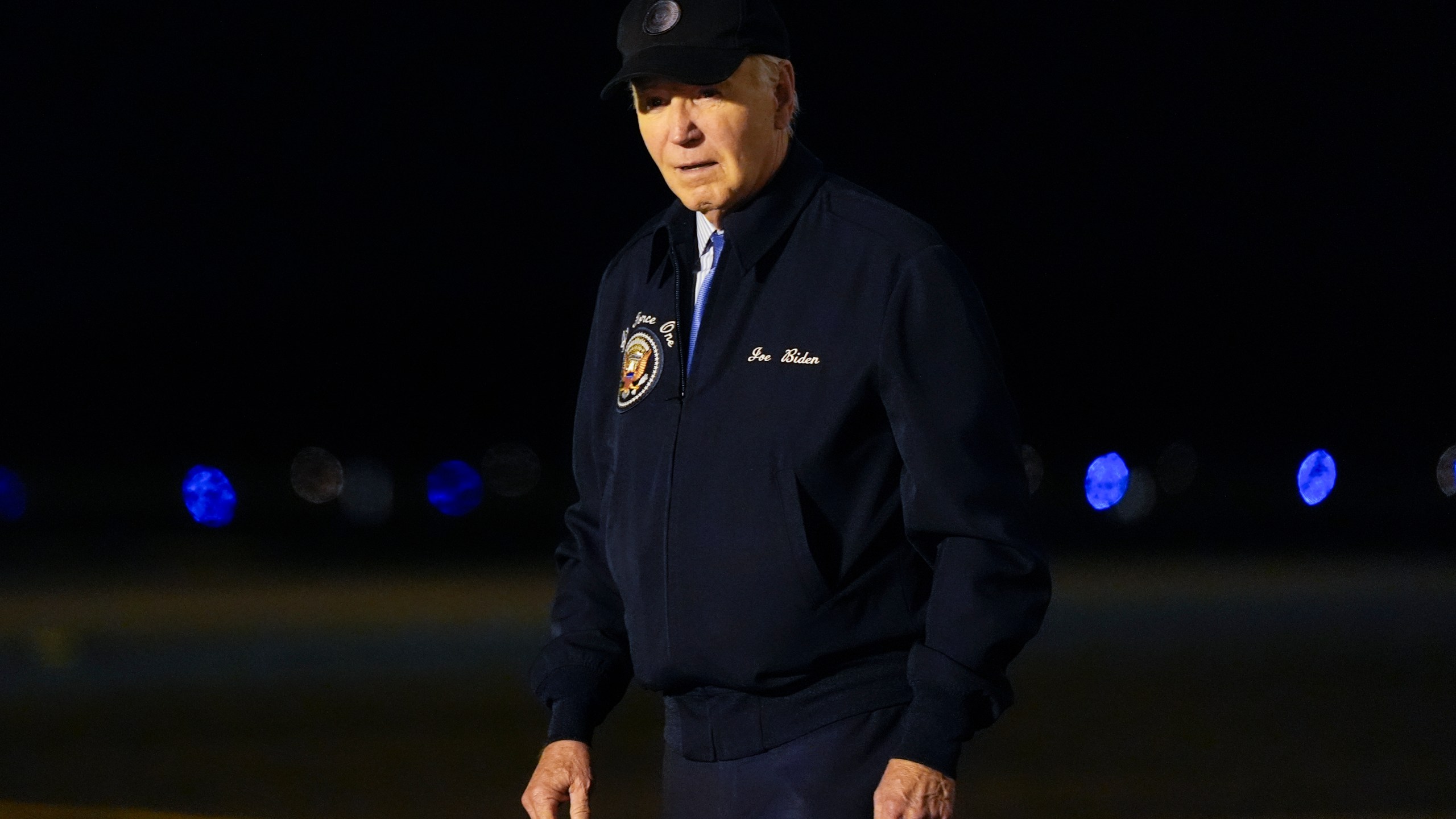 President Joe Biden walks to his car after stepping off of Air Force One at Dover Air Force Base in Delaware, Wednesday, July 17, 2024. Biden is returning to his home in Rehoboth Beach, Del., to self-isolate after testing positive for COVID-19. (AP Photo/Susan Walsh)