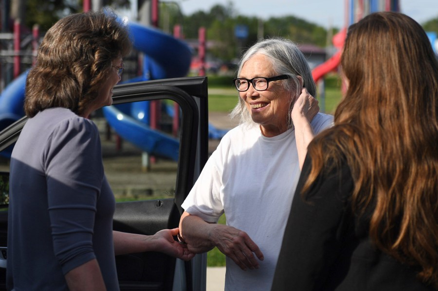 Sandra Hemme, center, meets with family and supporters after she was released from Chillicothe Correctional Center, Friday, July 19, 2024, in Chillicothe, Miss. Hemme's murder conviction was overturned after she served 43 years in prison, despite objections from Missouri’s attorney general. (HG Biggs/The Kansas City Star via AP)