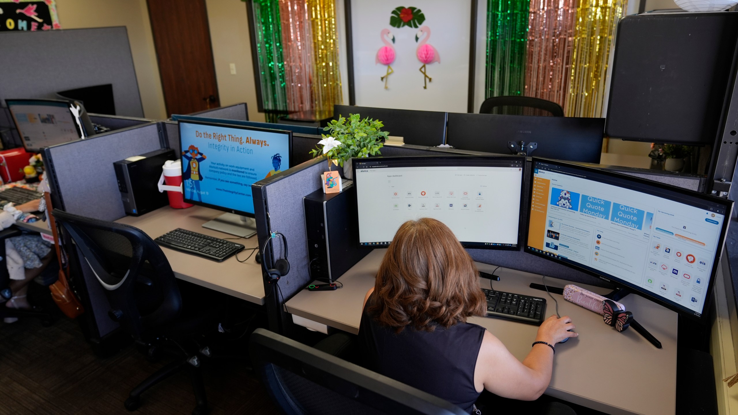 Senior Customer Experience Representative Laura Faubion takes calls at an Alorica center, Monday, Aug. 19, 2024, in San Antonio. (AP Photo/Eric Gay)