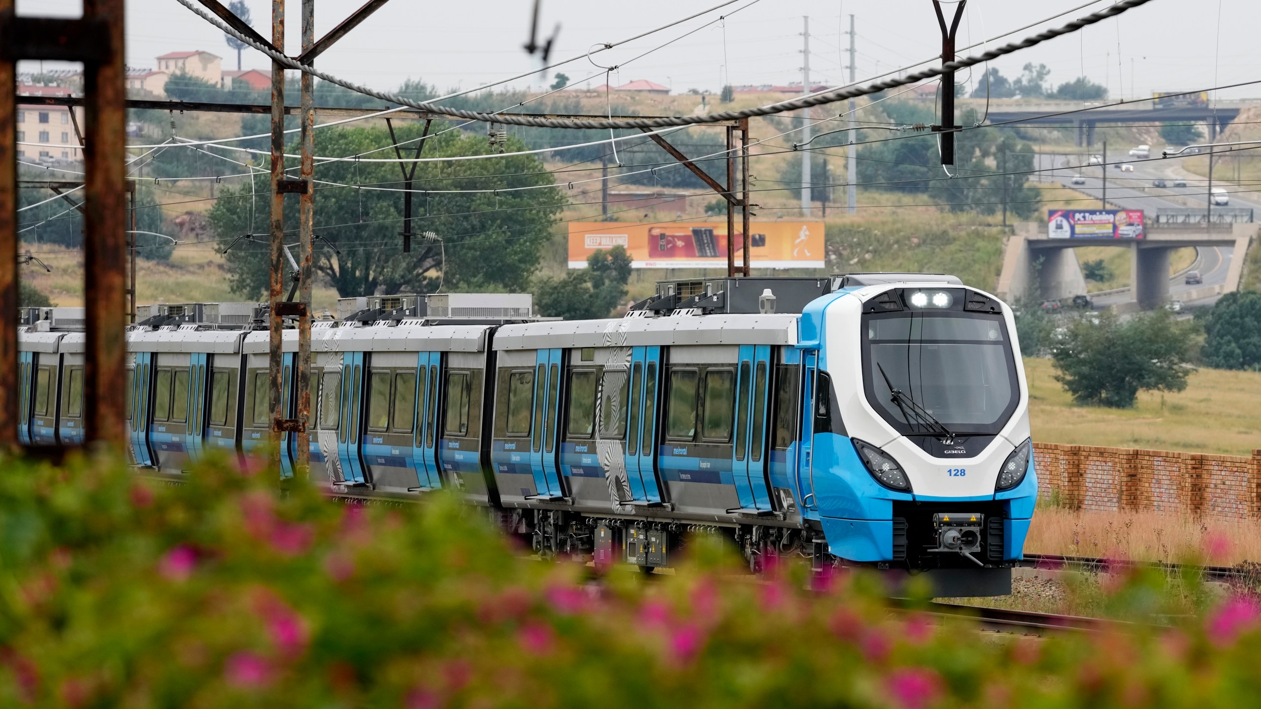 FILE - A newly launched Passenger Rail Agency of South Africa train traveling from Johannesburg to Naledi in Soweto, South Africa, Feb. 8, 2023. (AP Photo/Themba Hadebe, File)