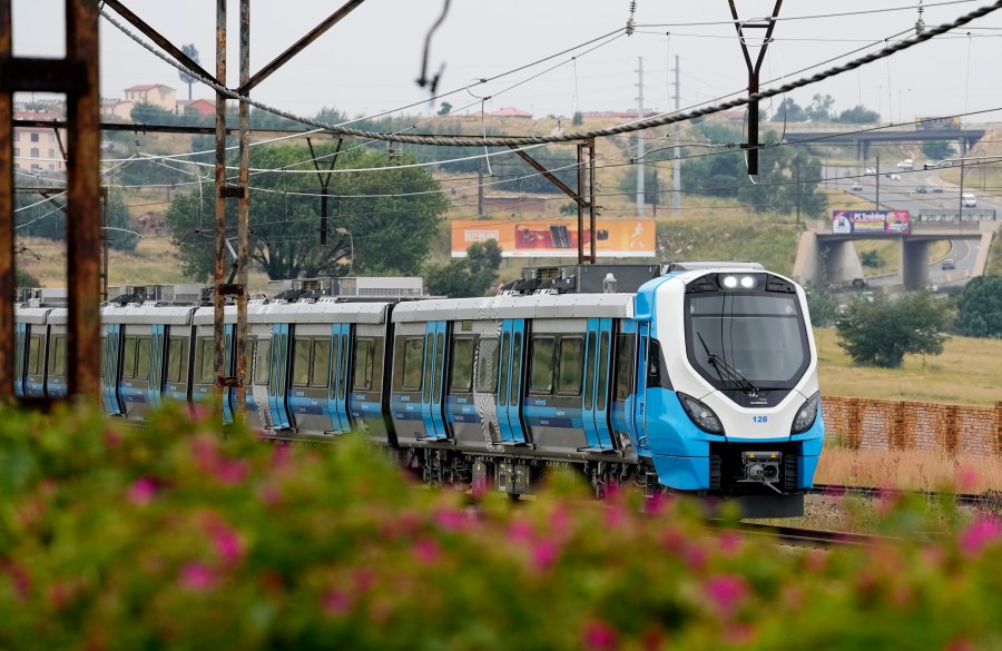 FILE - A newly launched Passenger Rail Agency of South Africa train traveling from Johannesburg to Naledi in Soweto, South Africa, Feb. 8, 2023. (AP Photo/Themba Hadebe, File)