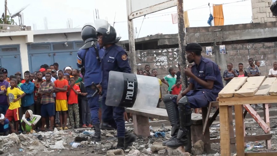 This image made from video shows police officers outside Makala prison in Kinshasa, Democratic Republic of the Congo, following an attempted jailbreak in Congo's main prison Monday Sept. 2, 2024. (AP Photo)