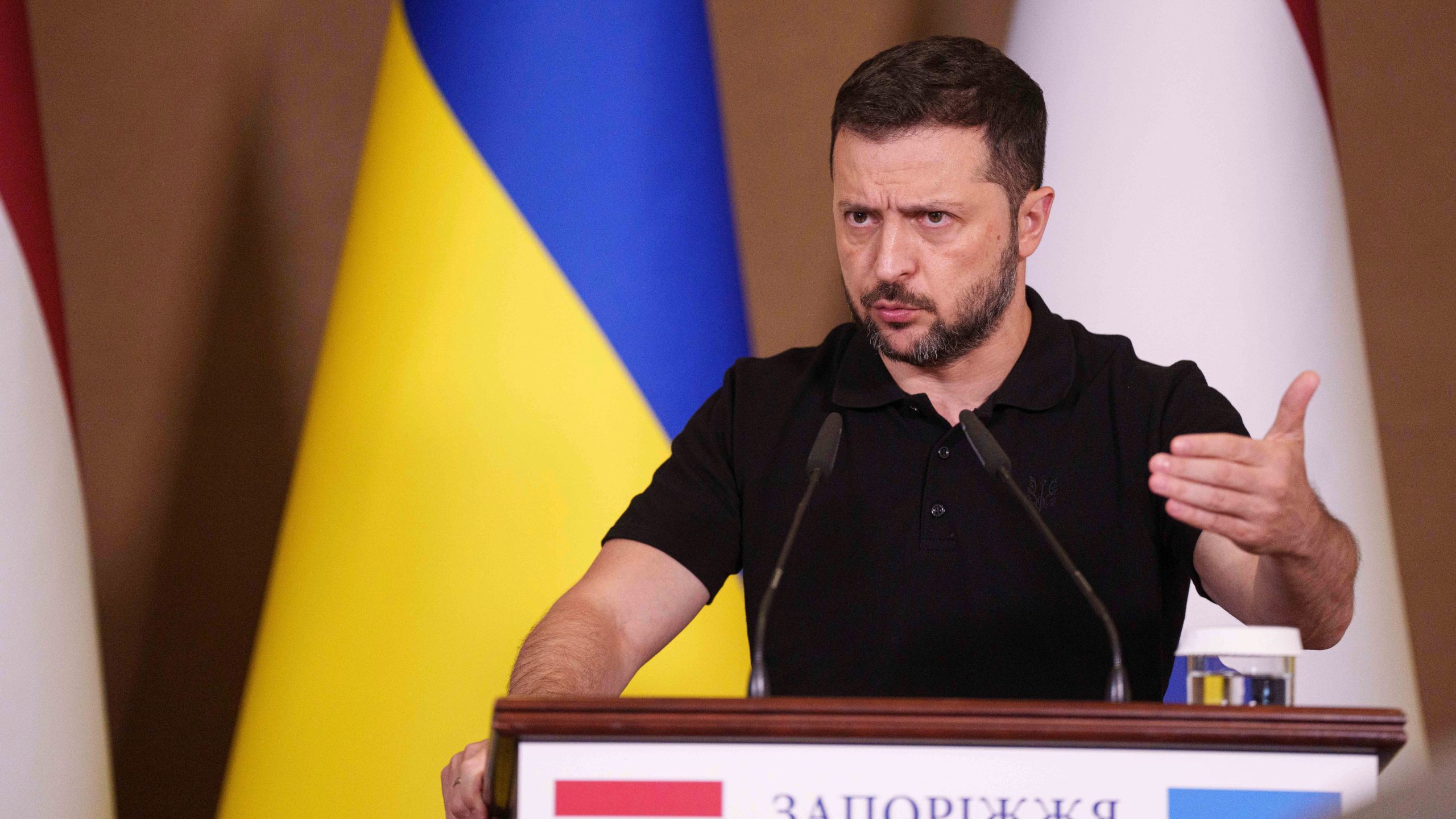 Ukrainian President Volodymyr Zelenskyy speaks during a joint press conference with Netherlands' Prime Minister Dick Schoof in Zaporizhzhia, Ukraine, Monday Sept. 2, 2024. (AP Photo/Evgeniy Maloletka)