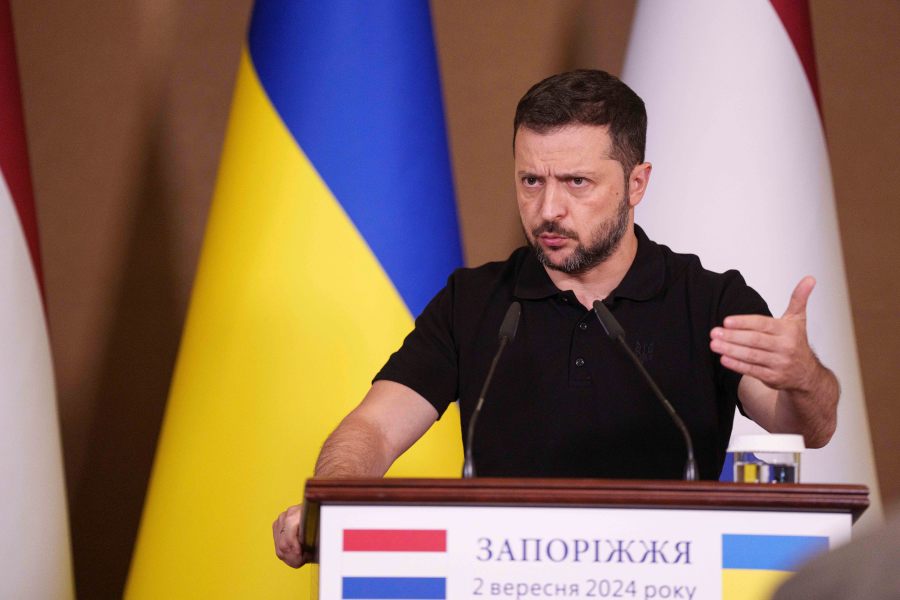 Ukrainian President Volodymyr Zelenskyy speaks during a joint press conference with Netherlands' Prime Minister Dick Schoof in Zaporizhzhia, Ukraine, Monday Sept. 2, 2024. (AP Photo/Evgeniy Maloletka)