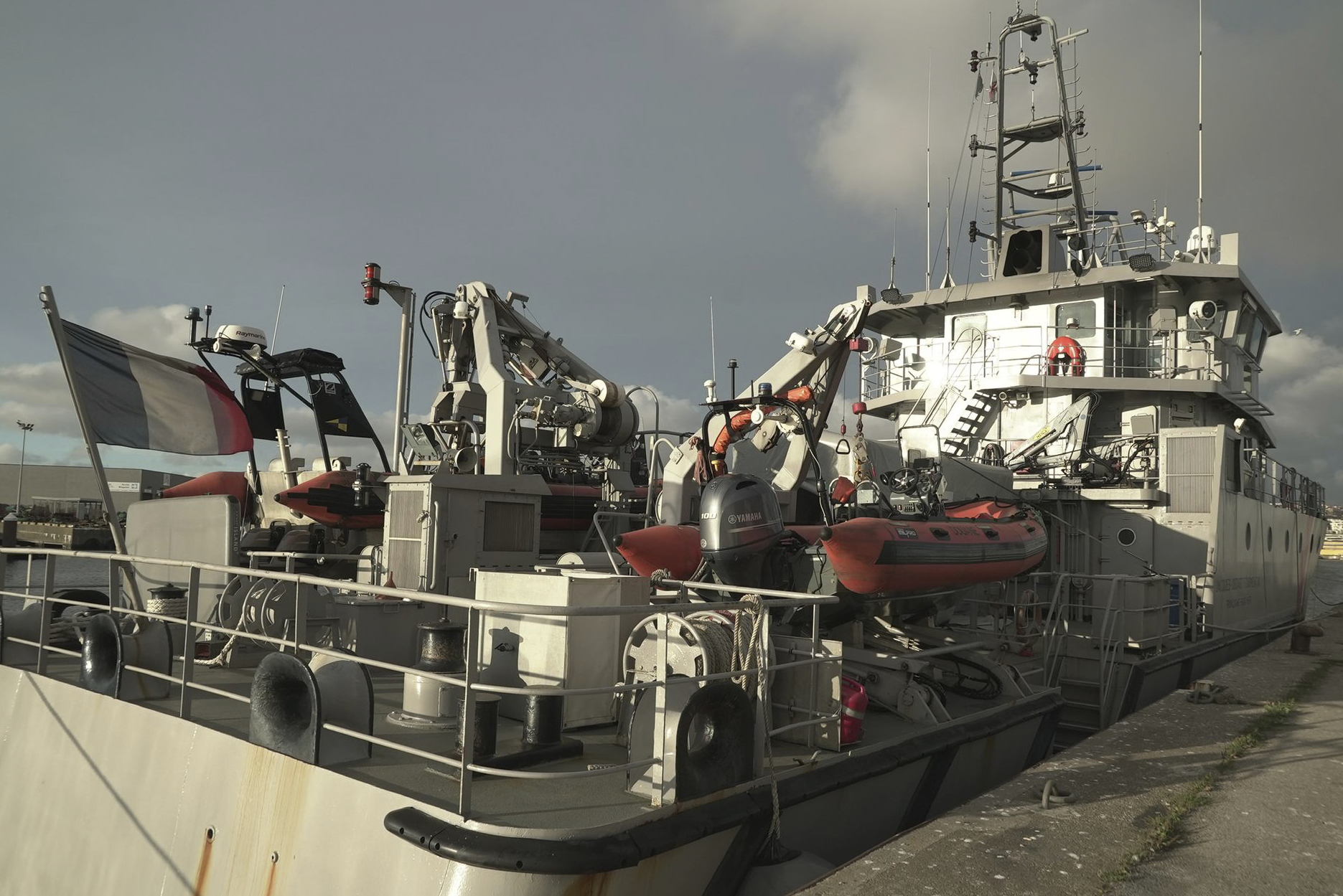 A view of one of the vessels from the French Gendarmerie Nationale in the port of Boulogne-Sur-Mer, France, Tuesday, Sept. 3, 2024, after participating in the rescue operation after a boat carrying migrants ripped apart attempting to cross the English Channel. (AP Photo/Nicolas Garriga)