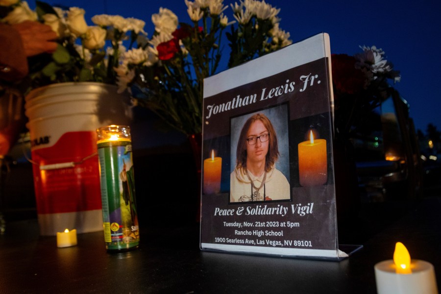 FILE - A memorial for Jonathan Lewis Jr. is set up in an alleyway near Rancho High School in eastern Las Vegas, Nov. 21, 2023. (AP Photo/Ty O'Neil, File)