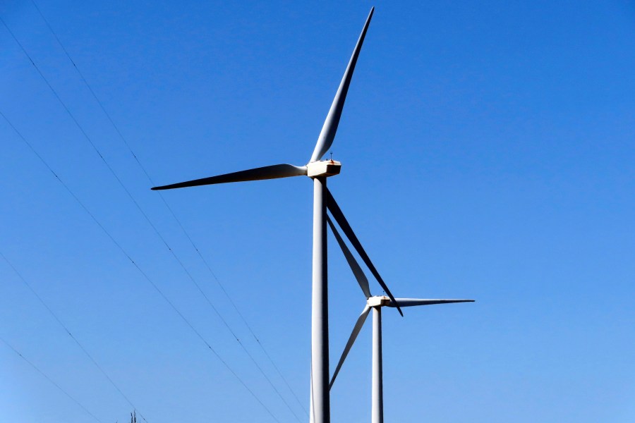 Land-based wind turbines spin in Atlantic City, N.J., April 28, 2022. (AP Photo/Wayne Parry)