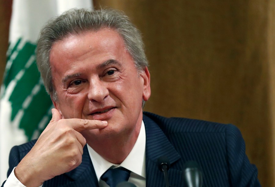 FILE - Riad Salameh, Lebanon's Central Bank governor, attends a news conference, in Beirut, on Nov. 11, 2019. Lebanon charged its embattled former central bank governor Wednesday with the embezzlement of $42 million, three judicial officials told The Associated Press. (AP Photo/Hussein Malla, File)