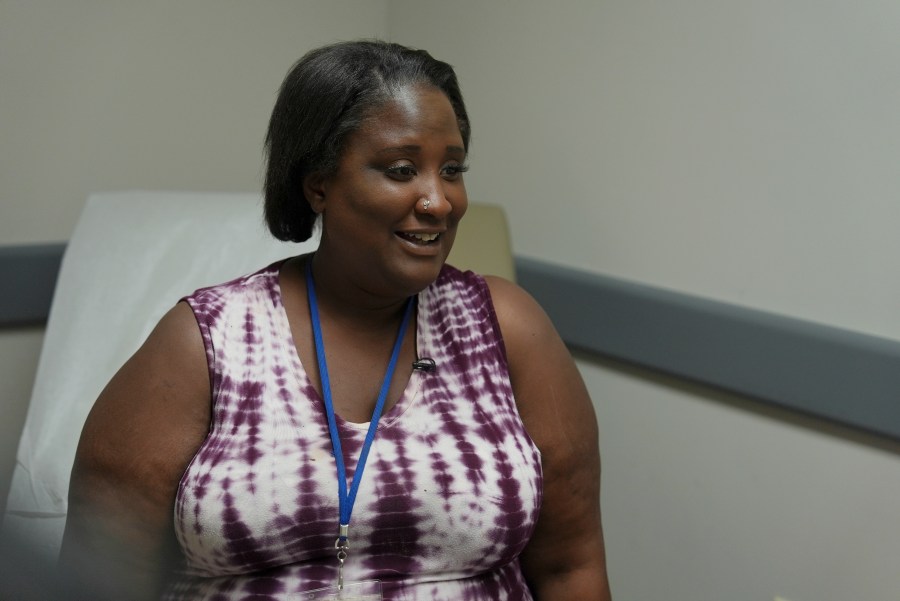 Denise Jones speaks with a doctor during a prenatal appointment at the Oklahoma State University obstetrics and gynecology clinic in Tulsa, Okla., on Tuesday, July 16, 2024. (AP Photo/Mary Conlon)