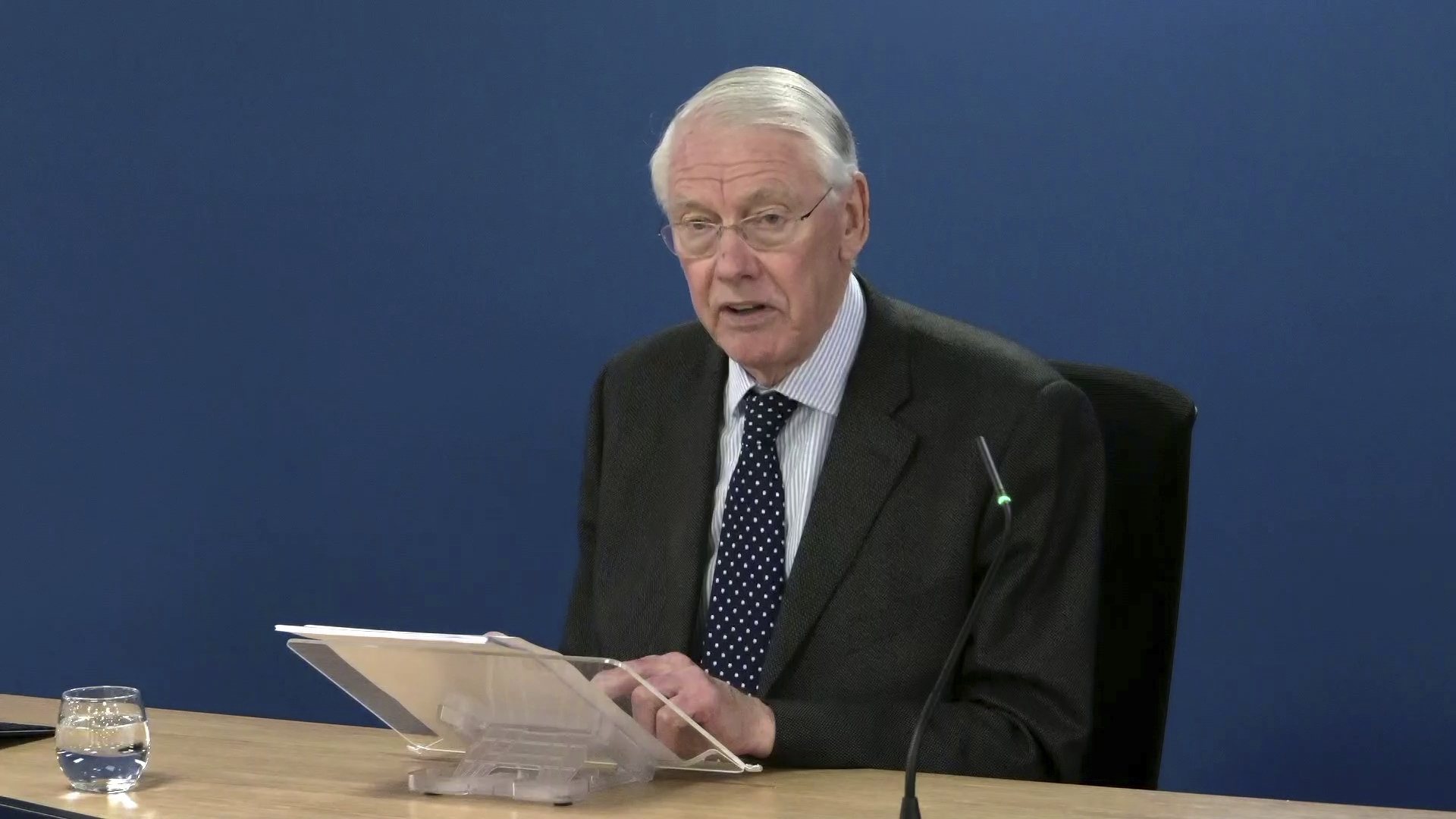 In this screengrab from handout footage issued by the Grenfell Tower Inquiry, inquiry chairman Sir Martin Moore-Bick, reads a statement following the publication of the final report by the long-running Grenfell Tower Inquiry, Wednesday, Sept. 4, 2024. (Grenfell Tower Inquiry/PA via AP)