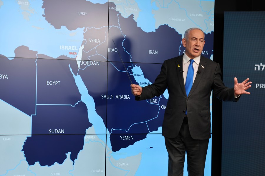 Israeli Prime Minister Benjamin Netanyahu stands before a map during a press conference at the Government Press office in Jerusalem, Wednesday, Sept. 4, 2024. (Abir Sultan/Pool via AP)