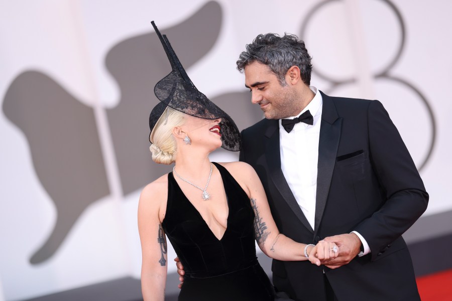 Lady Gaga, left, and Michael Polansky pose for photographers upon arrival for the premiere of the film 'Joker: Folie A Deux' during the 81st edition of the Venice Film Festival in Venice, Italy, on Wednesday, Sept. 4, 2024. (Photo by Vianney Le Caer/Invision/AP)