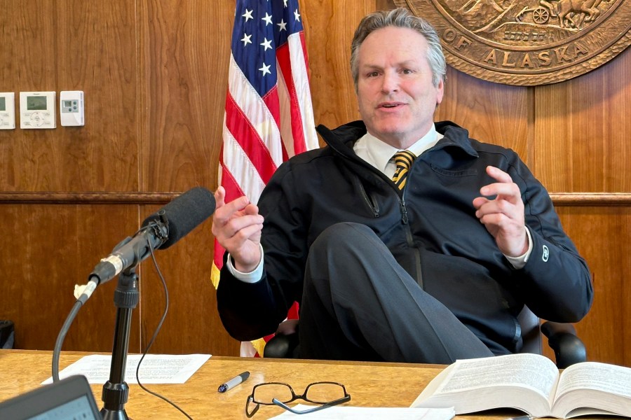 FILE - Alaska Gov. Mike Dunleavy gestures while speaking with reporters on May 1, 2024, in Juneau, Alaska. (AP Photo/Becky Bohrer, File)