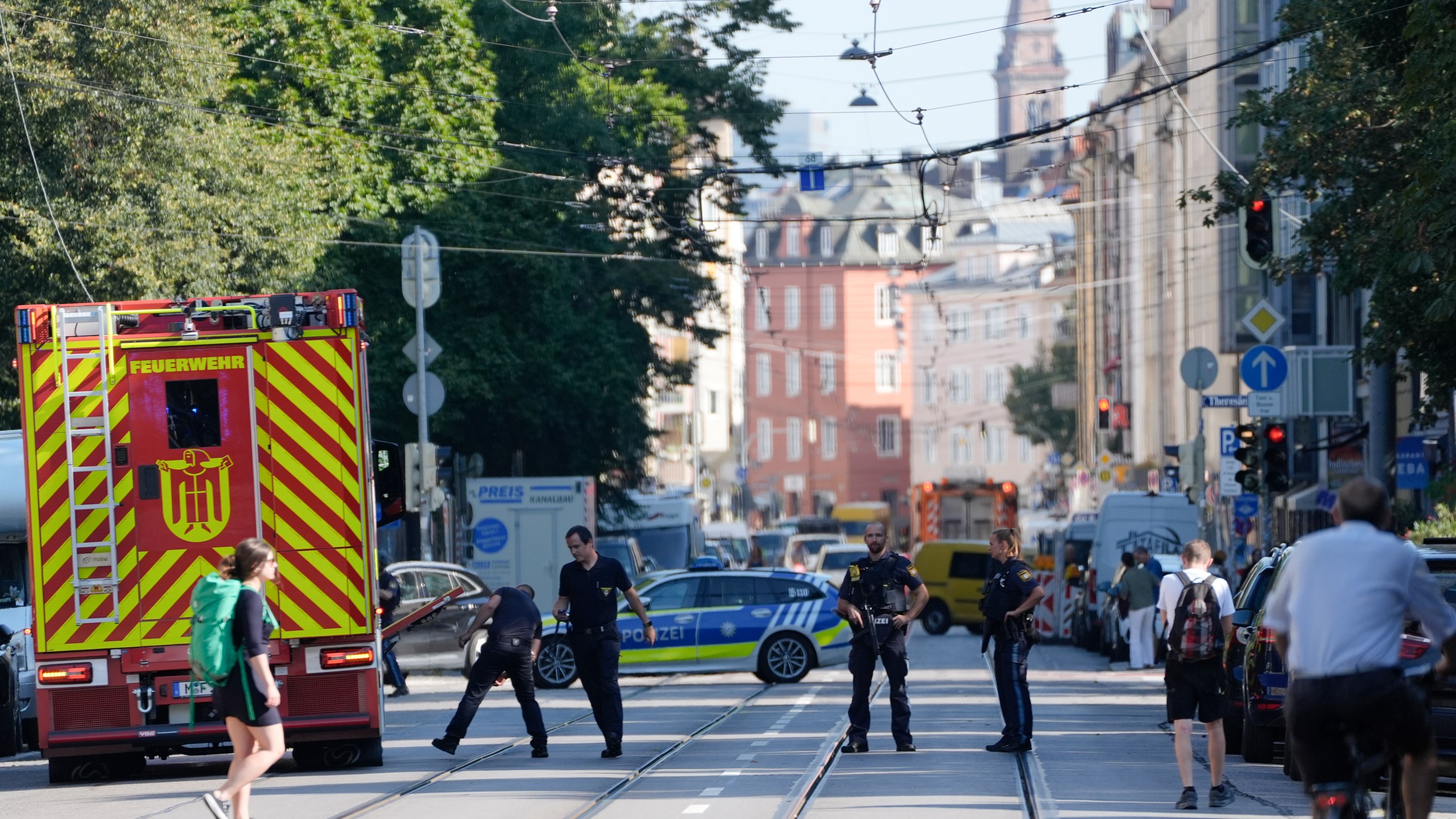 Police officers block a street after police fired shots at a suspicious person near the Israeli Consulate and a museum on the city's Nazi-era history in Munich, Germany, Thursday, Sept. 5, 2024. (AP Photo/Matthias Schrader)