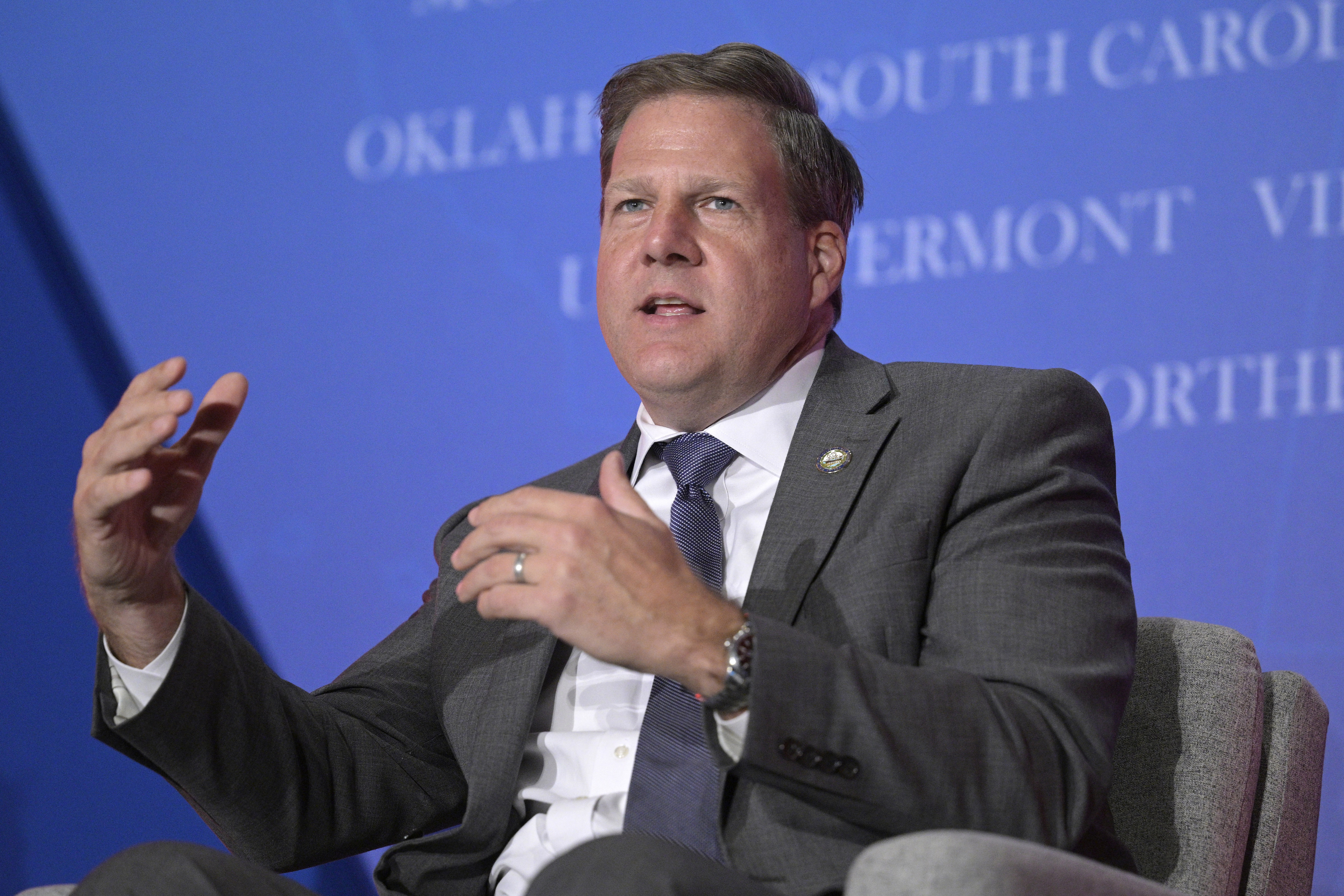 FILE - New Hampshire Gov. Chris Sununu takes part in a panel discussion, Nov. 15, 2022, in Orlando, Fla. (AP Photo/Phelan M. Ebenhack, File)