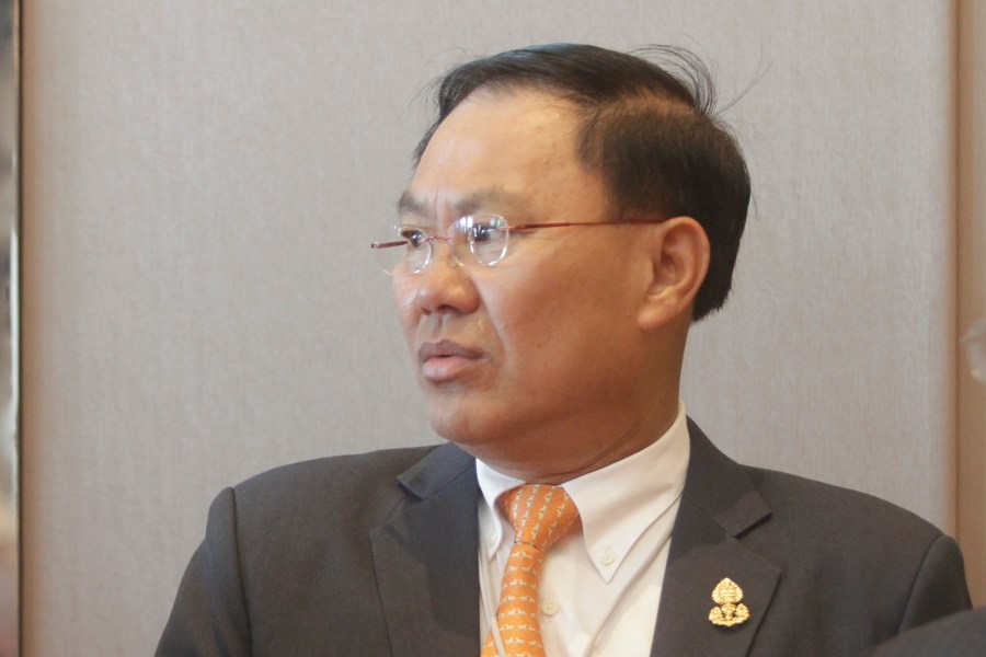 FILE - Cambodian business tycoon Ly Yong Phat stands at the Cambodia-China Business and Investment Forum at the outskirt of Phnom Penh, Cambodia, Thursday, Dec. 1, 2016. (AP Photo/Heng Sinith)