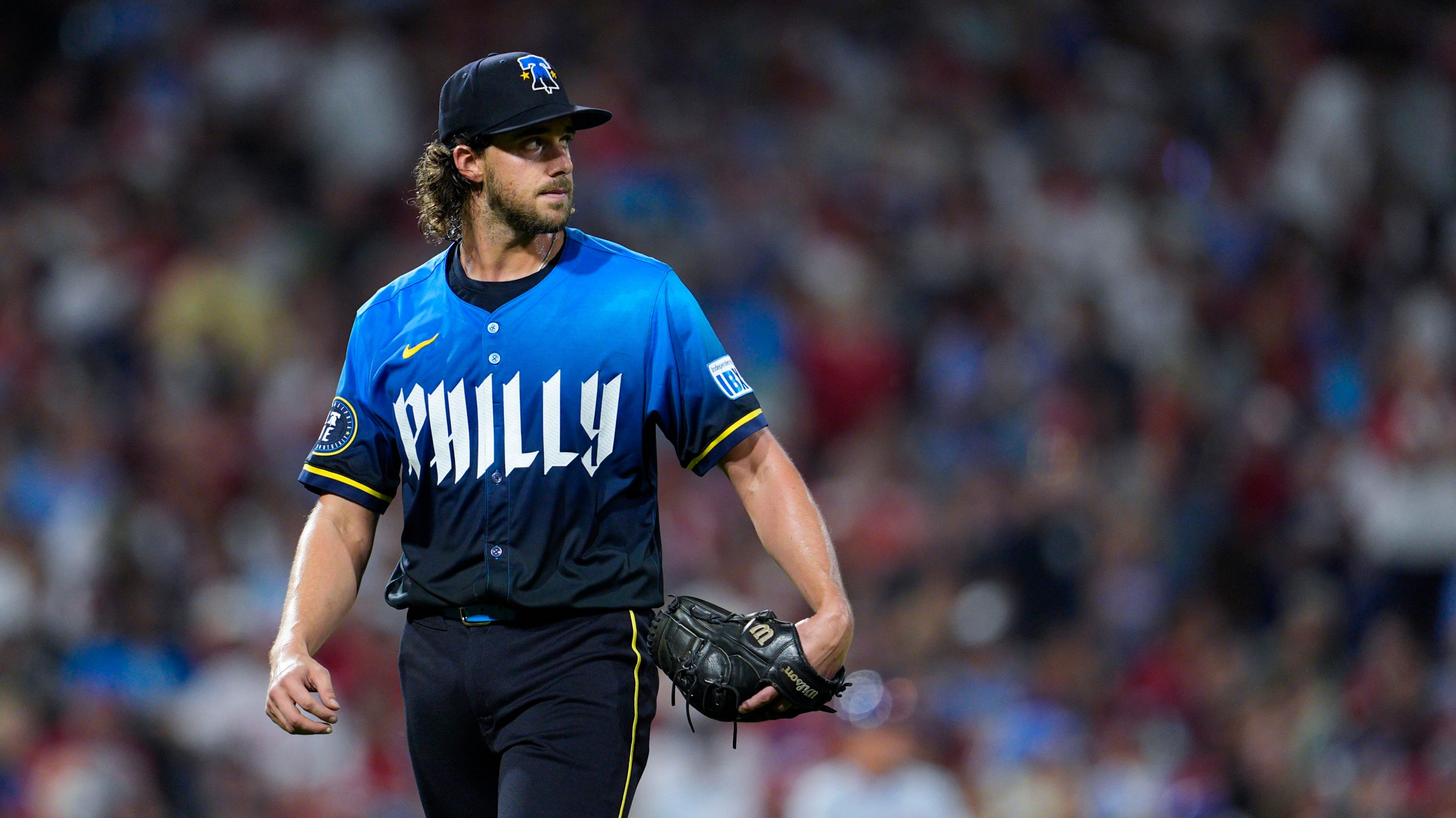 Philadelphia Phillies' Aaron Nola walks off the field after he was removed during the fifth inning of a baseball game against the New York Mets, Friday, Sept. 13, 2024, in Philadelphia. (AP Photo/Derik Hamilton)