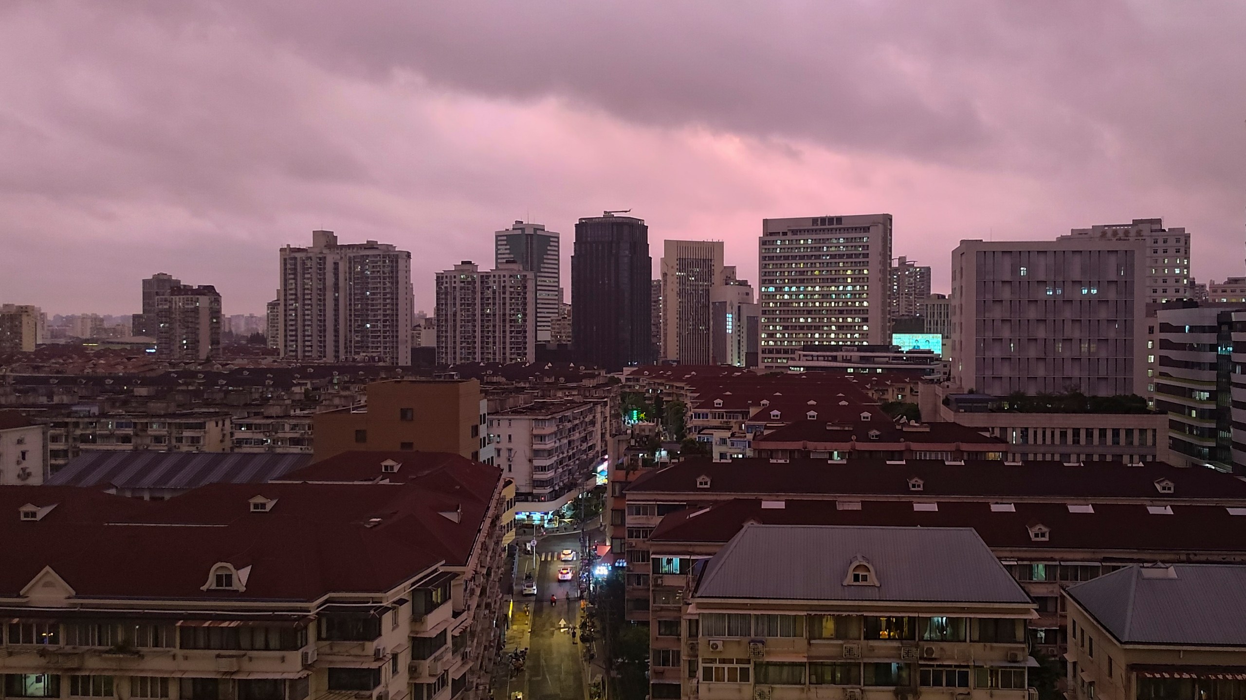 A view of pink cloudy skyline is seen in Shanghai, China, Sunday, Sept. 15, 2024. (Chinatopix Via AP)