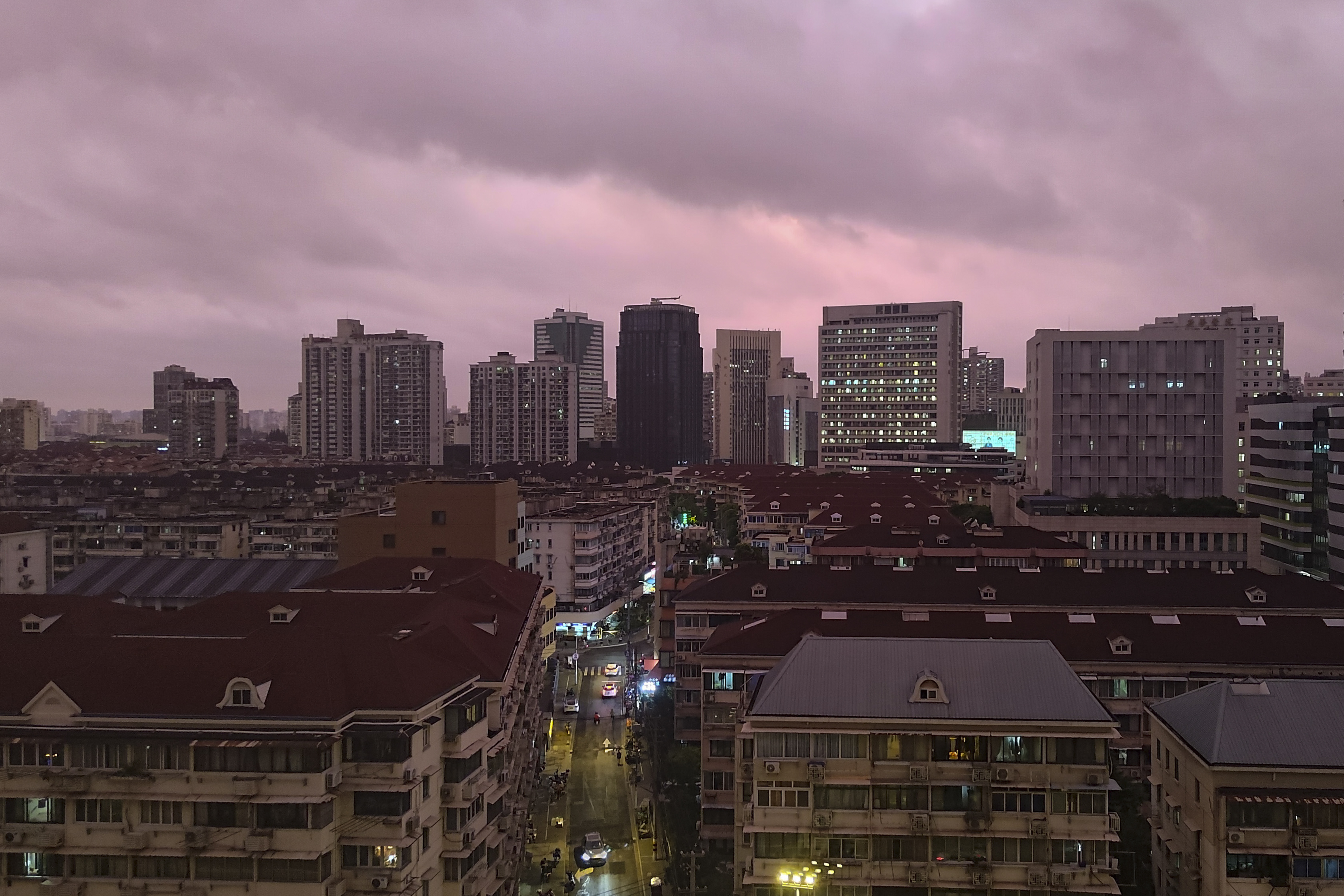 A view of pink cloudy skyline is seen in Shanghai, China, Sunday, Sept. 15, 2024. (Chinatopix Via AP)