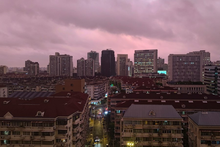 A view of pink cloudy skyline is seen in Shanghai, China, Sunday, Sept. 15, 2024. (Chinatopix Via AP)