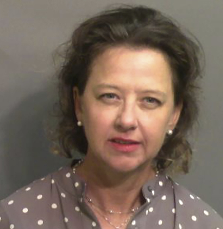 FILE - This jail booking photo provided by Glynn County Sheriff's Office, shows Jackie Johnson, the former district attorney for Georgia's Brunswick Judicial Circuit, after she turned herself in to the Glynn County jail in Brunswick, Ga, Sept. 8, 2021. (Glynn County Sheriff's Office via AP, File)