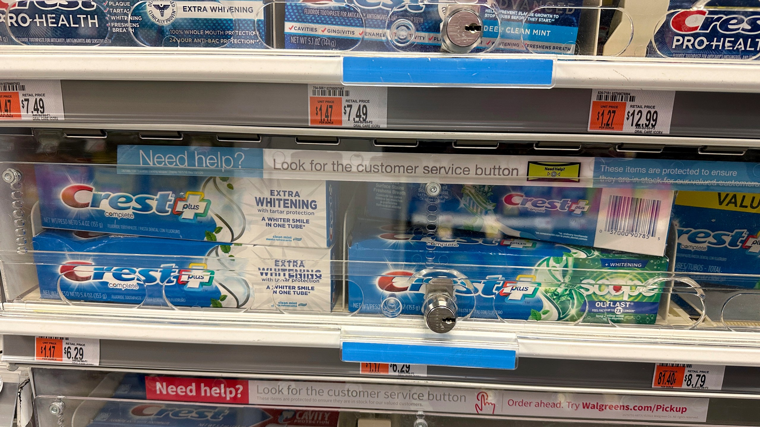 FILE - Tubes of toothpaste are displayed behind a locked, plastic barrier to prevent shoplifters from stealing the products at a store in the Manhattan borough of New York on January 31, 2024. (AP Photo/Ted Shaffrey)