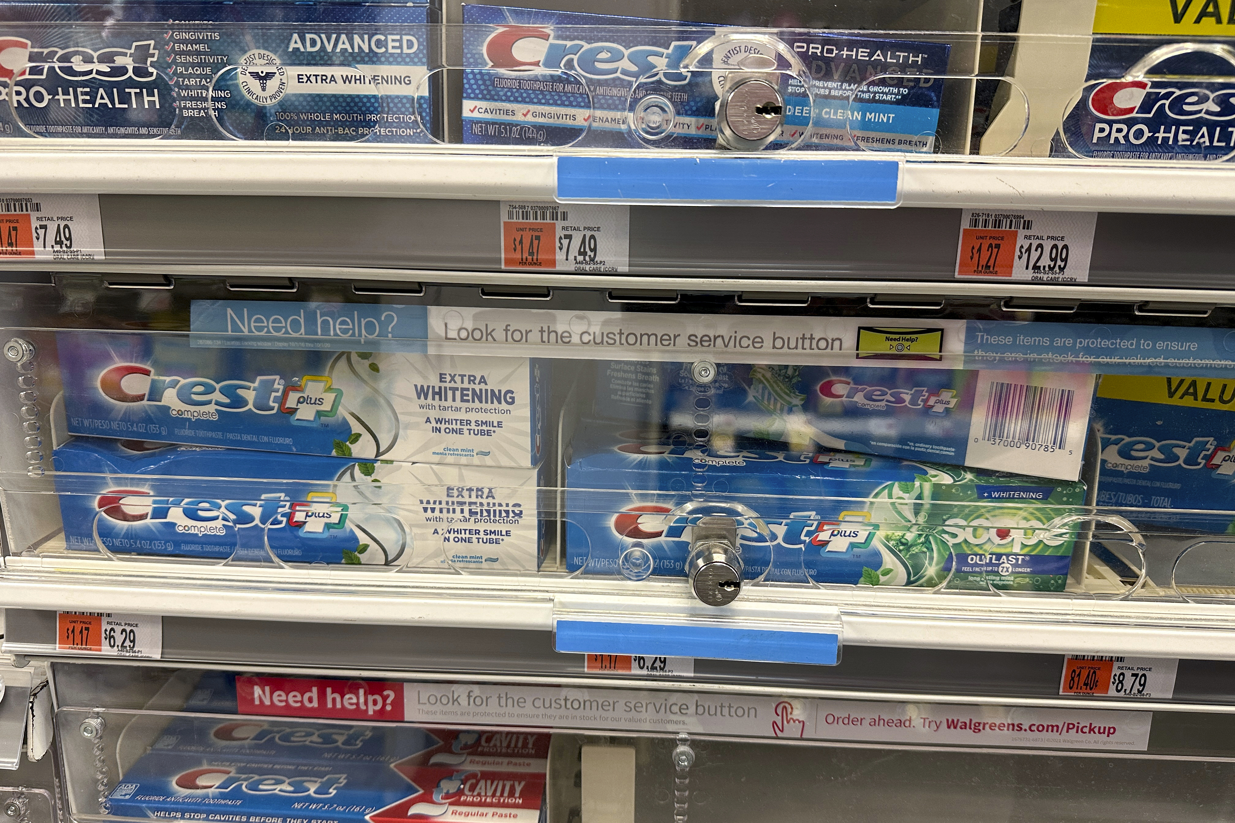 FILE - Tubes of toothpaste are displayed behind a locked, plastic barrier to prevent shoplifters from stealing the products at a store in the Manhattan borough of New York on January 31, 2024. (AP Photo/Ted Shaffrey)