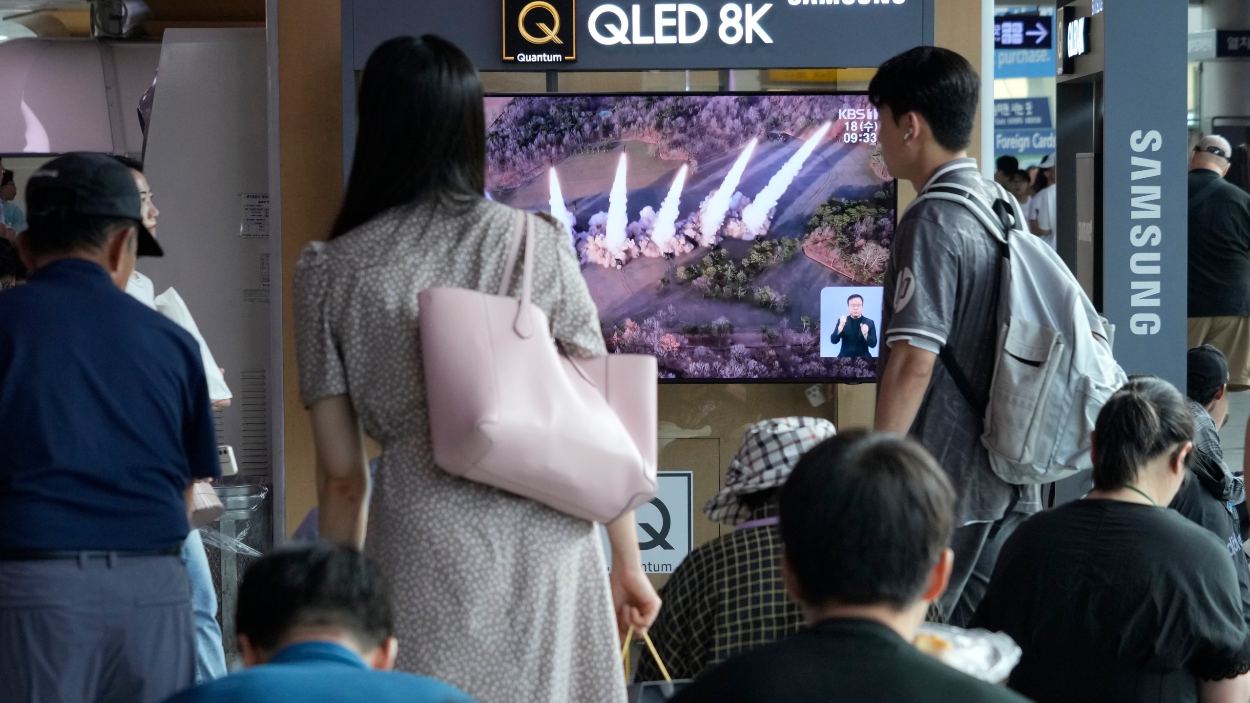 A TV screen shows a file image of North Korea's missiles launch during a news program at Seoul Railway Station in Seoul, South Korea, Wednesday, Sept. 18, 2024. (AP Photo/Ahn Young-joon)