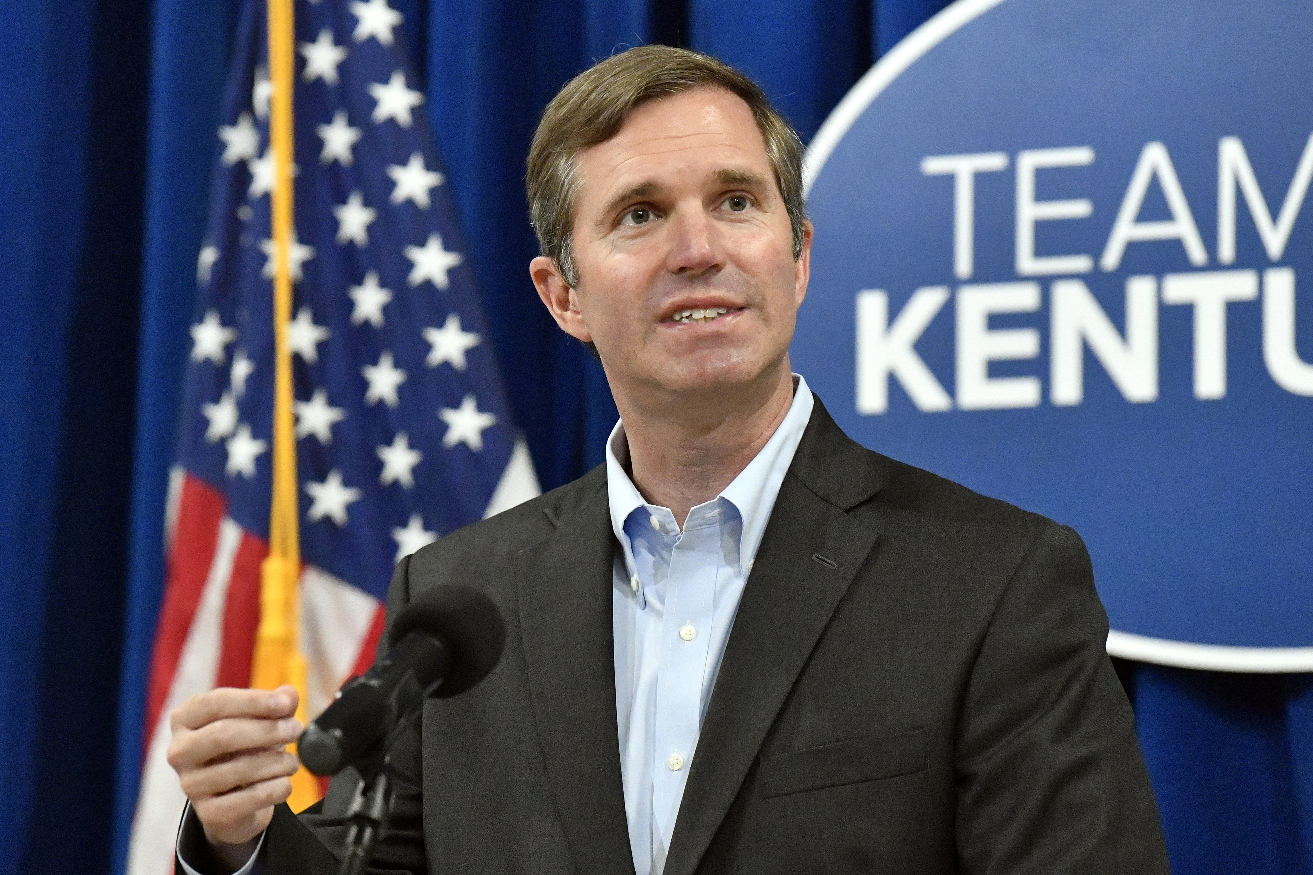 Kentucky Gov. Andy Beshear speaks to a group gathered to celebrate the governor signing an executive order banning the use of “conversion therapy” on minors, Wednesday, Sept. 18, 2024, in Frankfort, Ky. (AP Photo/Timothy D. Easley)