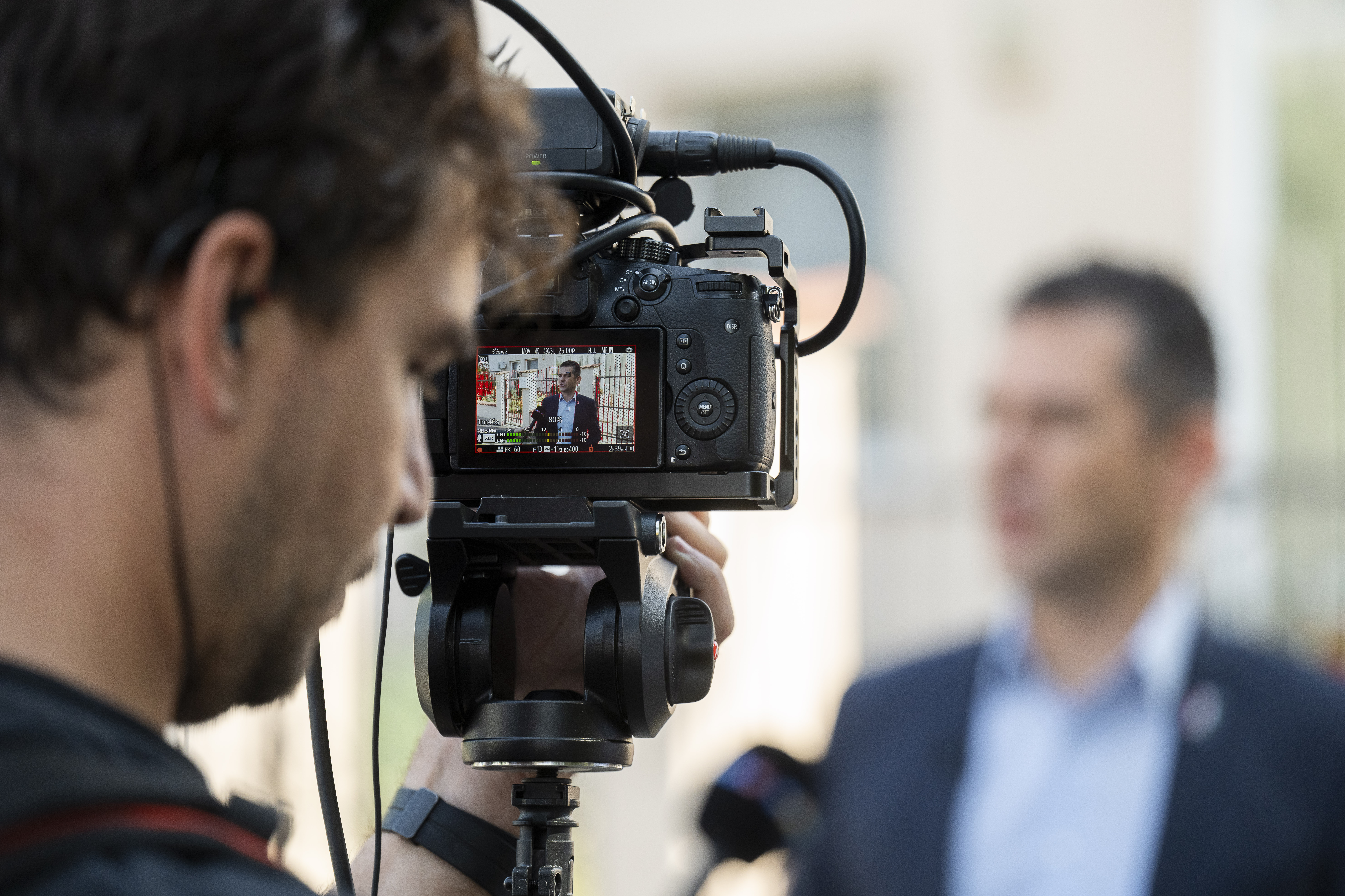 Előd Novak, a member of the National Assembly of Hungary, talks to the local media in front of a house where a Hungarian company that allegedly manufactured pagers that exploded in Lebanon and Syria, is headquartered in Budapest Wednesday, Sept. 18, 2024. (AP Photo/Denes Erdos)