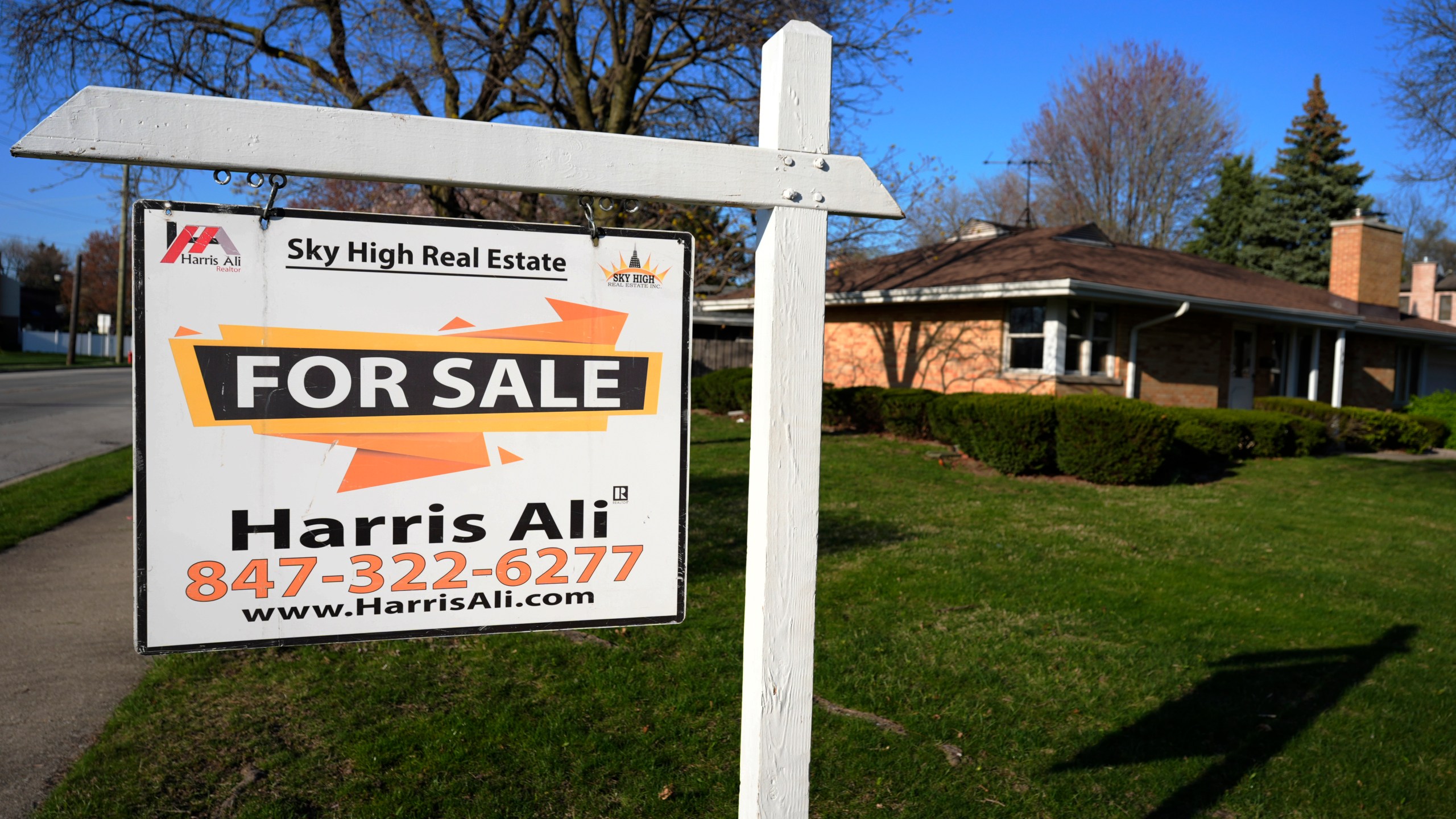 FILE - A "For Sale" sign is displayed in front of a home in Skokie, Ill., April 14, 2024. (AP Photo/Nam Y. Huh, File)