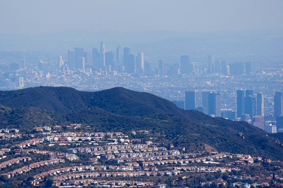 FILE - Downtown Los Angeles, above, is seen from the Topanga area of Los Angeles with the Century City area in the lower right Thursday, March 2, 2023. (AP Photo/Mark J. Terrill, File)