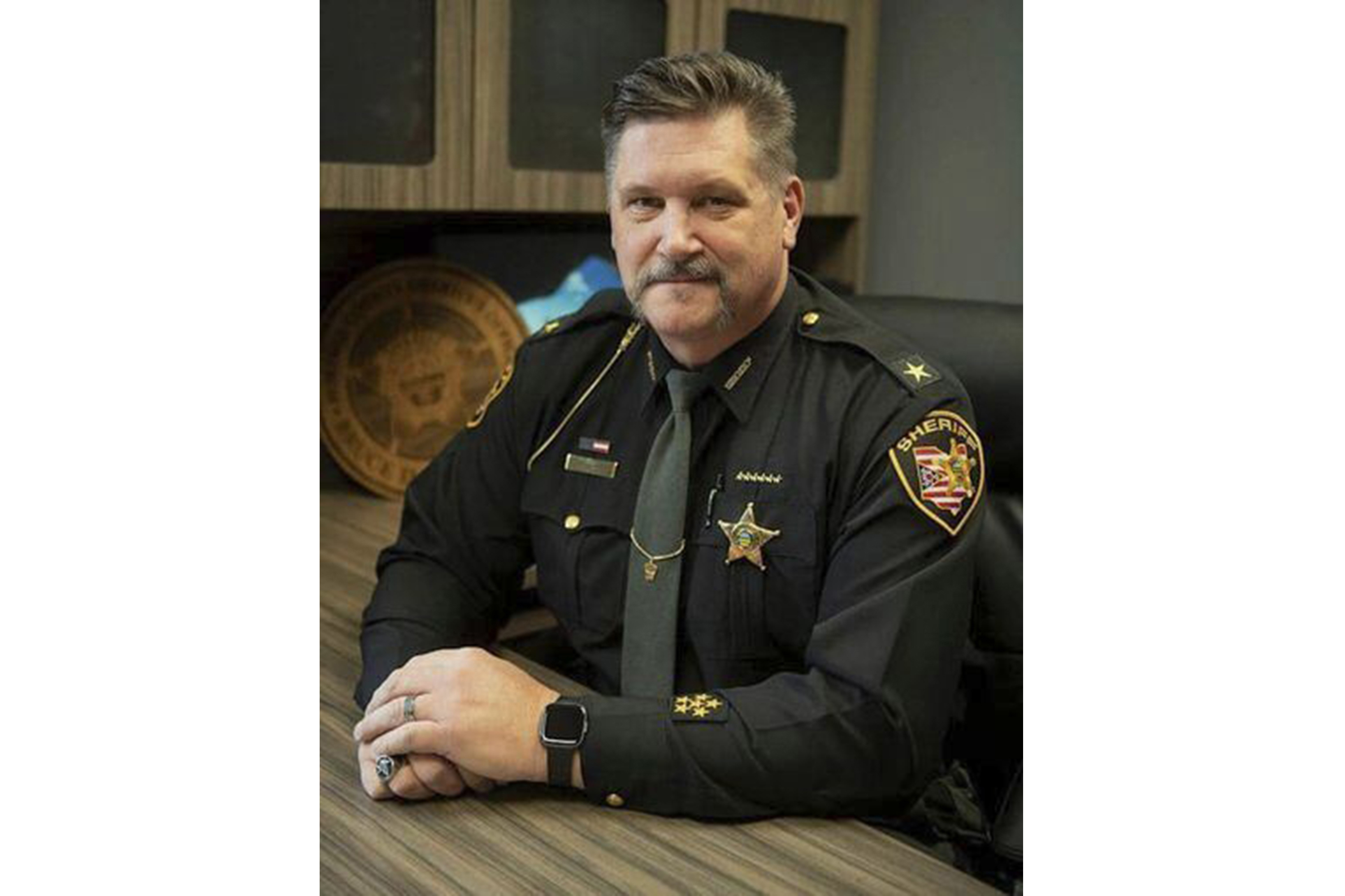 In this undated photo released by the Portage County Sheriff's Office, Sheriff Bruce D. Zuchowski poses. Zuchowski, is under fire for a social media post in which he said people with Kamala Harris yard signs should have their addresses recorded so that immigrants can be sent to live with them if Harris wins. (Portage County Sheriff's Office via AP)