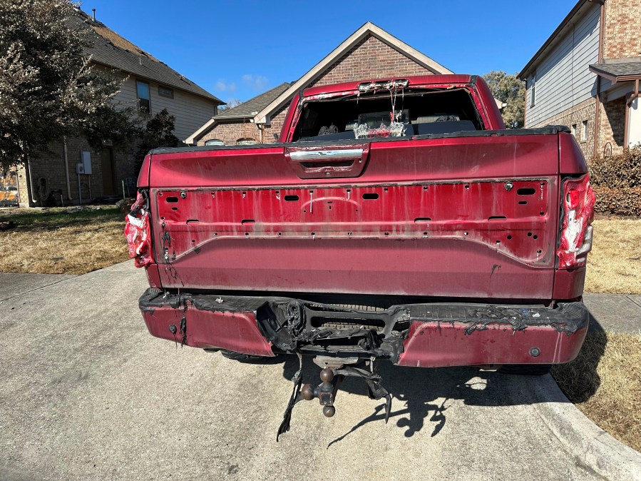 A truck that had parts of its equipment melted by the heat of a pipeline fire sits in the driveway of a home in Deer Park, Texas, on Thursday, Sept. 19, 2024. (AP Photo/Juan A. Lozano)(AP Photo/Juan A. Lozano)