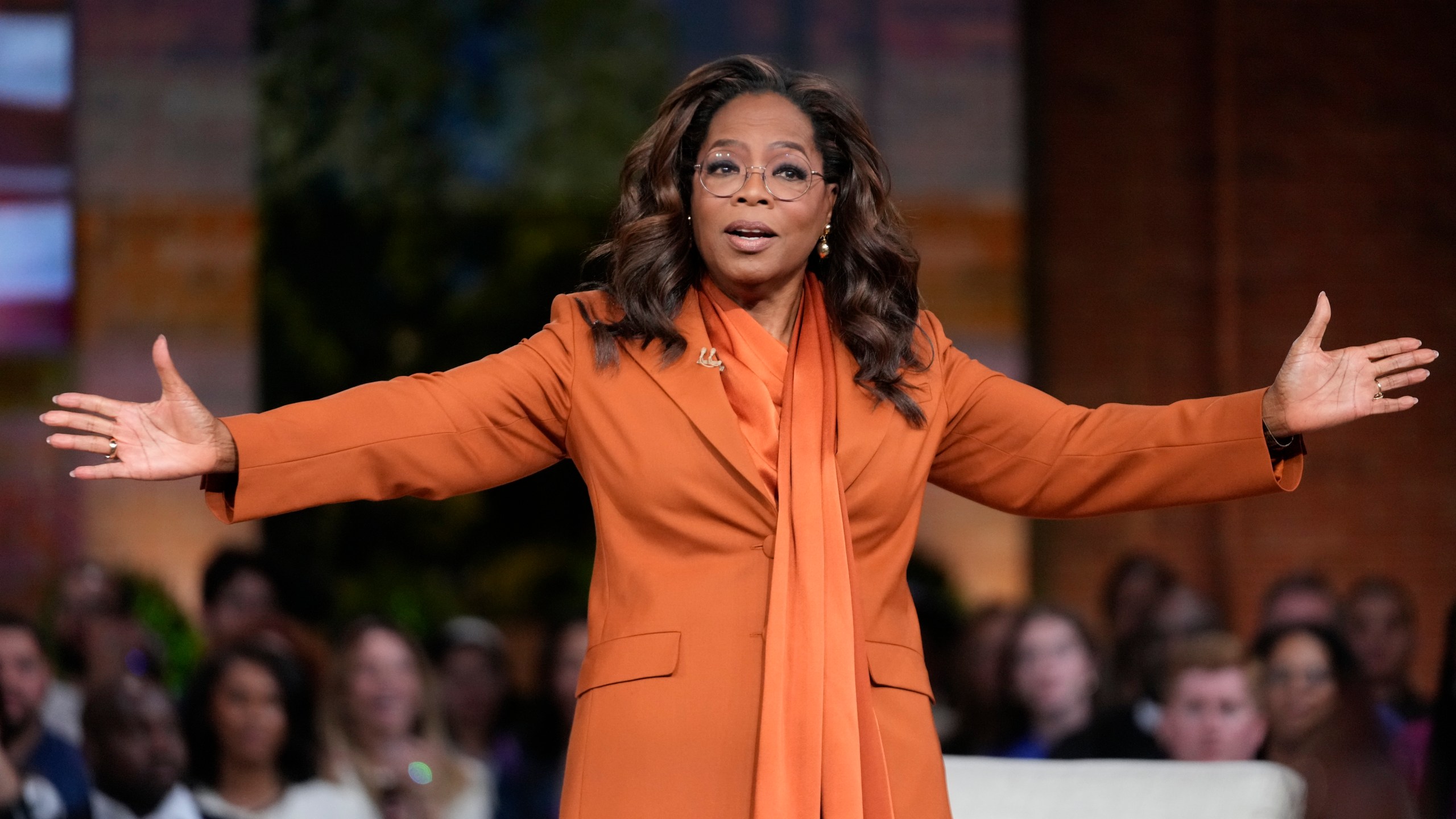 Oprah Winfrey speaks before Democratic presidential nominee Vice President Kamala Harris joins her at Oprah's Unite for America Live Streaming event Thursday, Sept. 19, 2024 in Farmington Hills, Mich. (AP Photo/Paul Sancya)