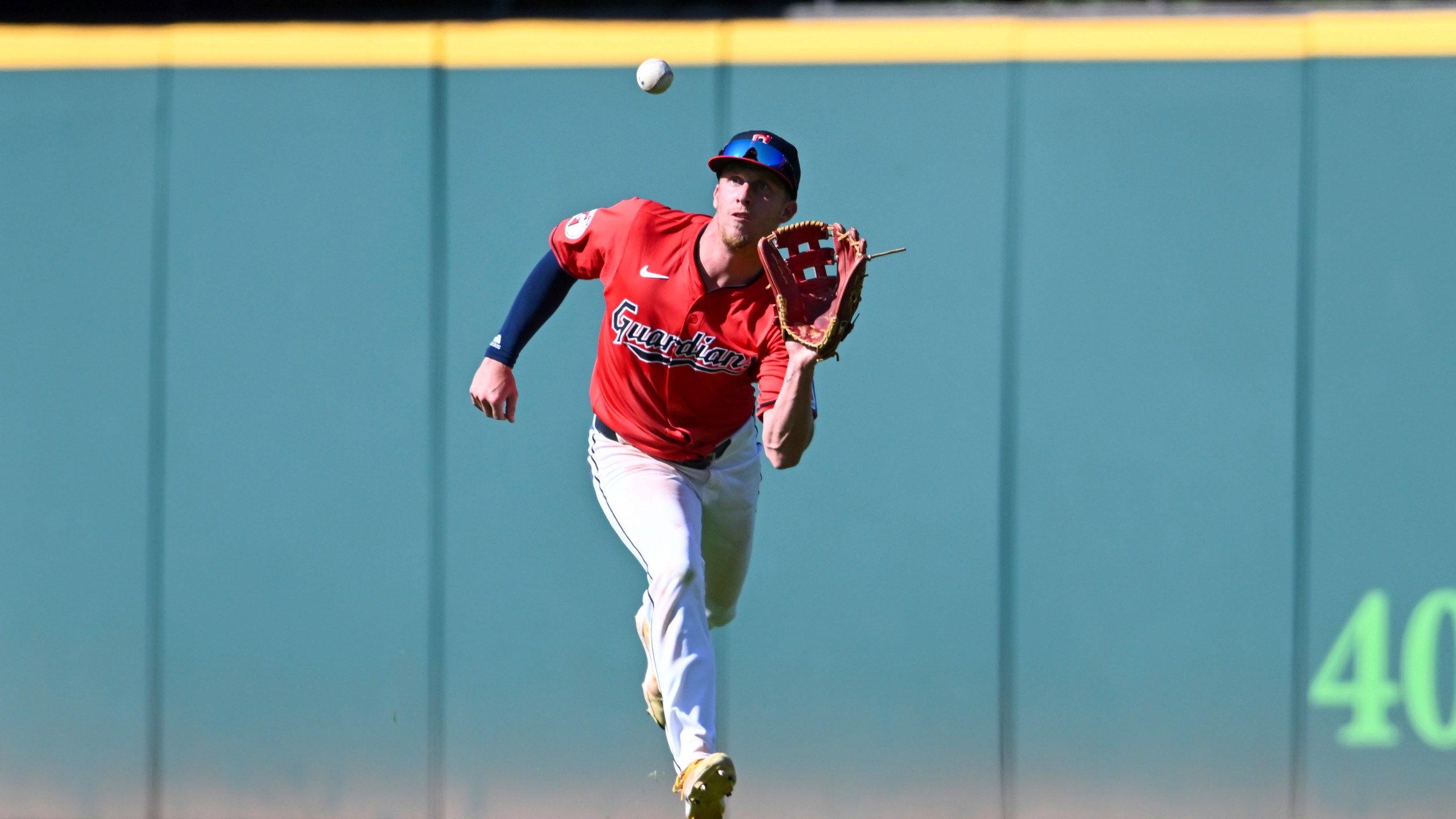 Cleveland Guardians' Myles Straw catches a fly ball during the ninth inning of a baseball game against the Minnesota Twins, Thursday, Sept. 19, 2024, in Cleveland. (AP Photo/Nick Cammett)