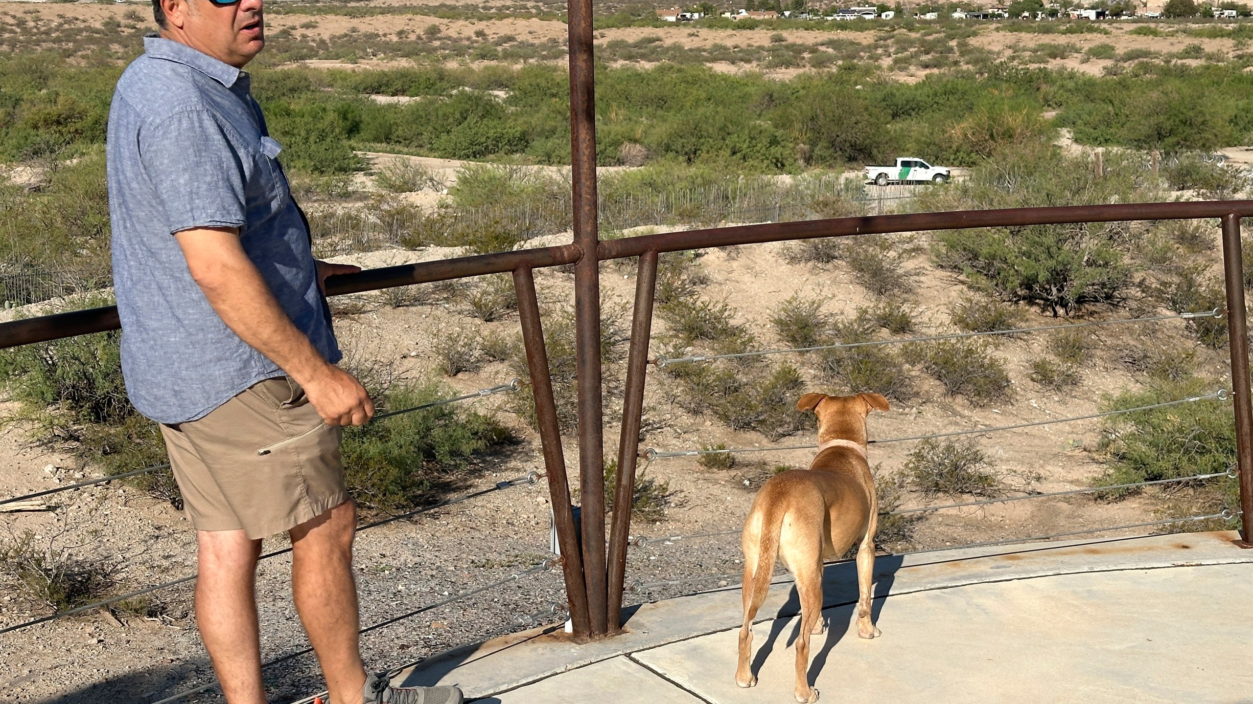 Robert Ardovino, a partner in a decades-old family restaurant business, surveys his property on the U.S. border with Mexico in Sunland Park, N.M., Thursday, Aug. 22, 2024. Ardovino has a close-up view of border enforcement efforts and bristles at politicians talking from afar about an "open border." The politics of immigration look different from communities on the Southwest border that are voting in hotly contested congressional races. (AP Photos/Morgan Lee)