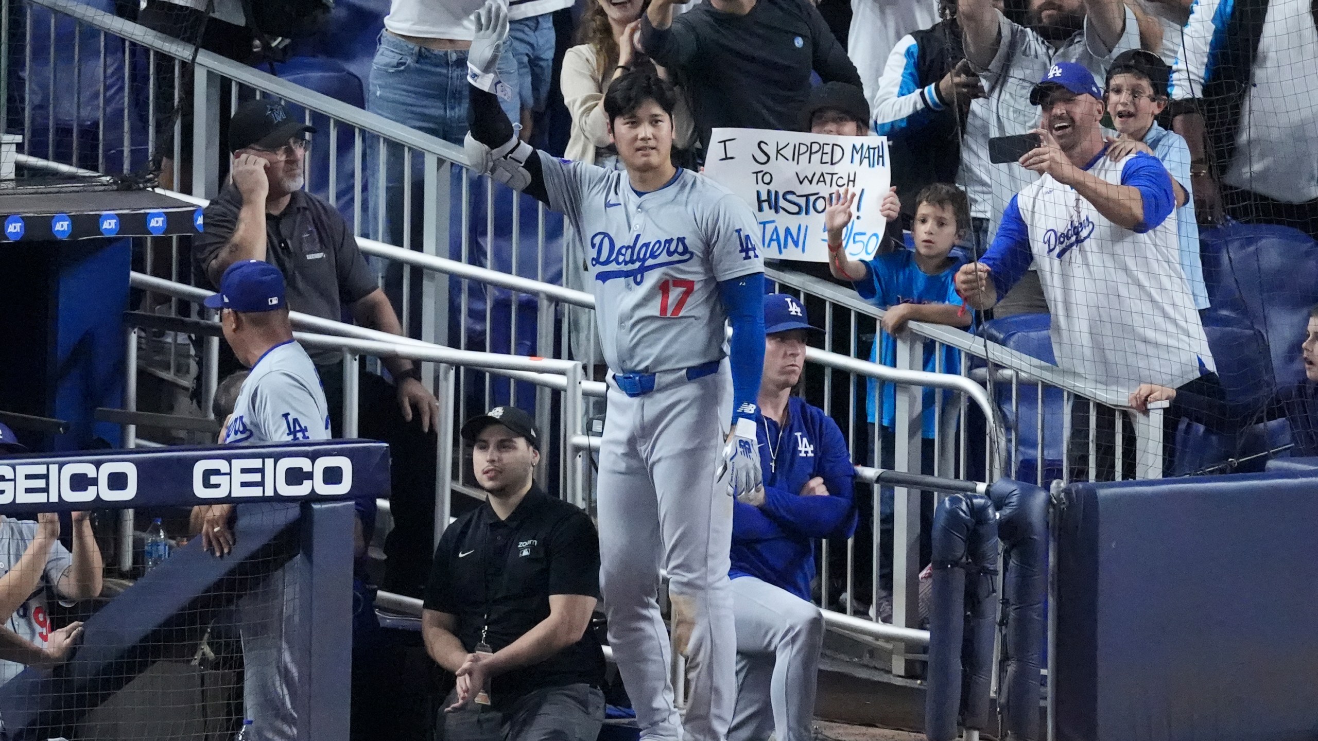 Los Angeles Dodgers' Shohei Ohtani (17) waves to fans after he hit a home run scoring Andy Pages, during the seventh inning of a baseball game against the Miami Marlins, Thursday, Sept. 19, 2024, in Miami. (AP Photo/Wilfredo Lee)