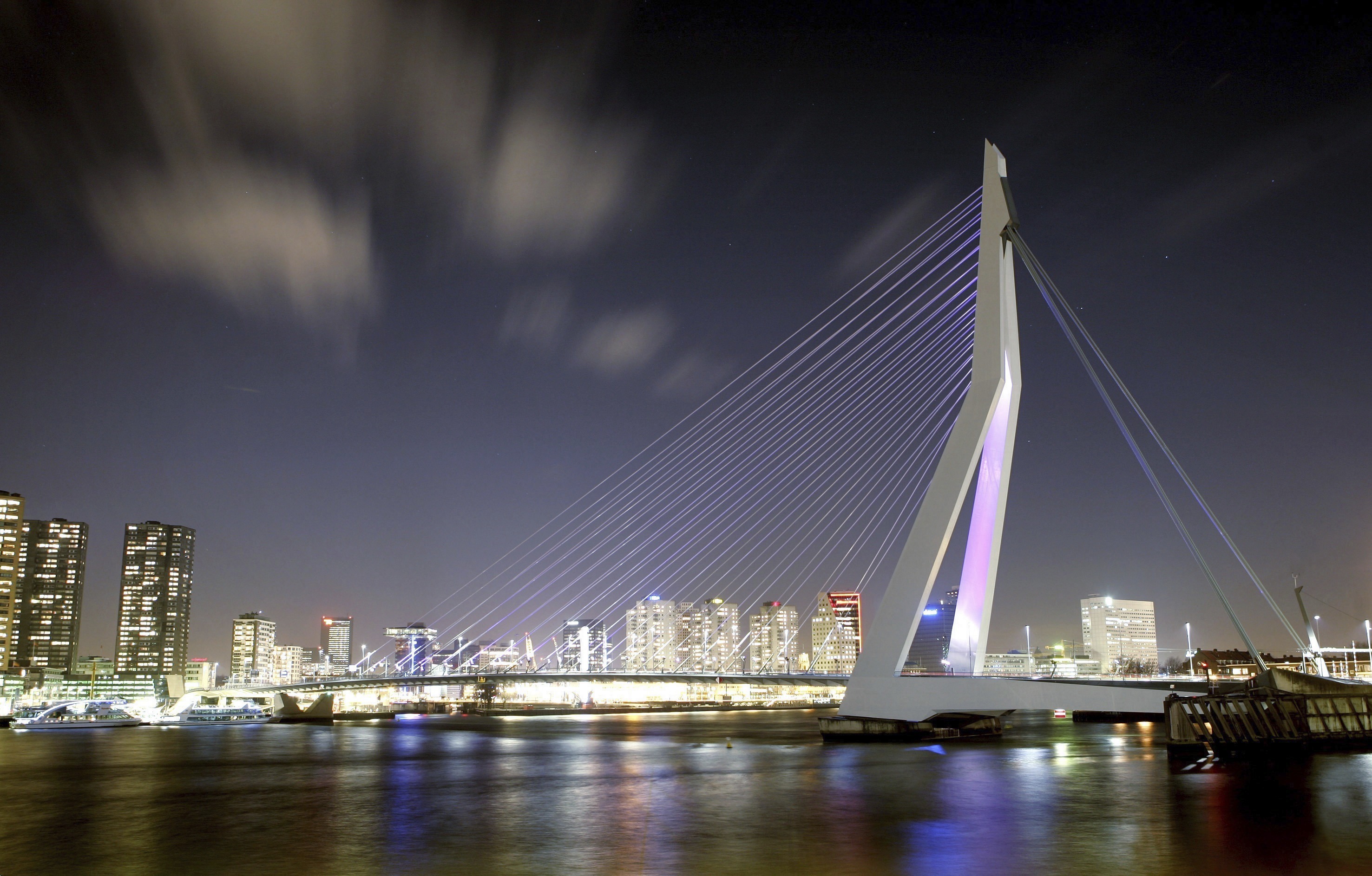 FILE - The Erasmus Bridge towers over the river Maas in Rotterdam, the Netherlands, April 2007. (AP Photo/ Bas Czerwinski, File)