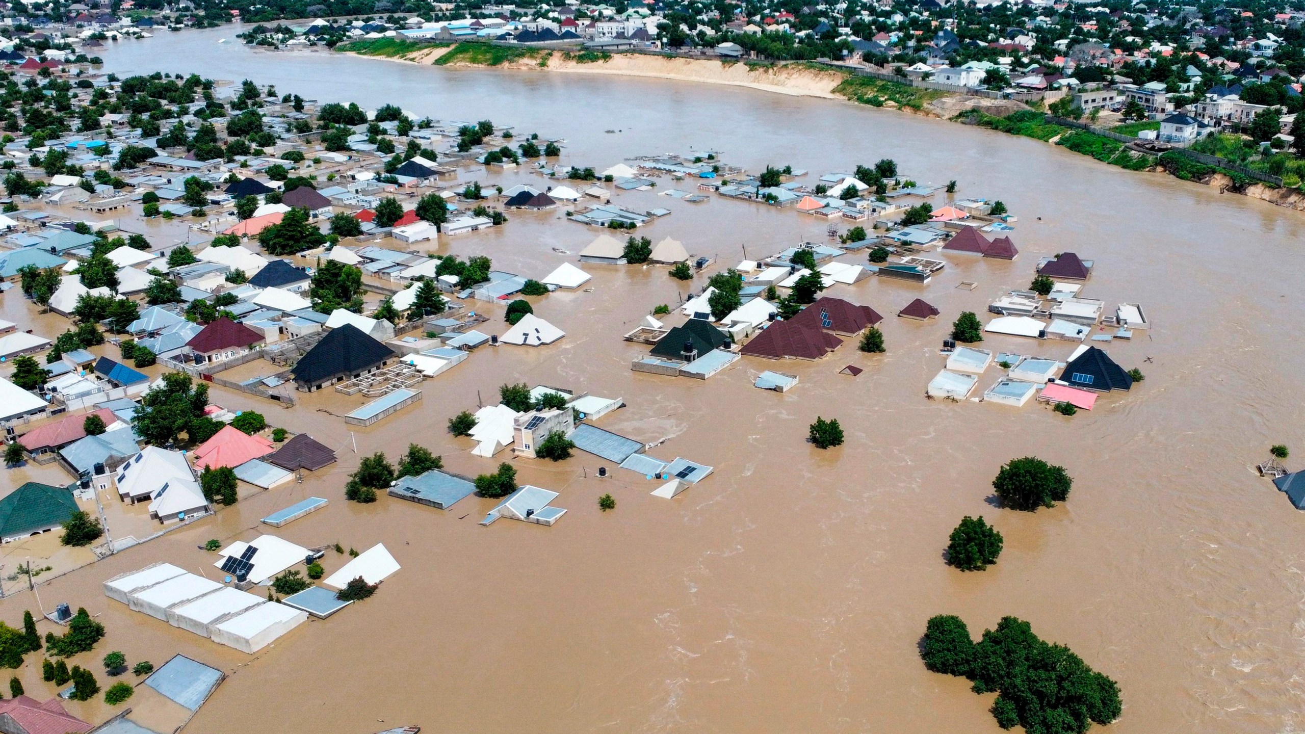 Houses are partially submerged following a dam collapse in Maiduguri, Nigeria, Tuesday, Sept 10, 2024. (AP Photos/ Musa Ajit Borno)