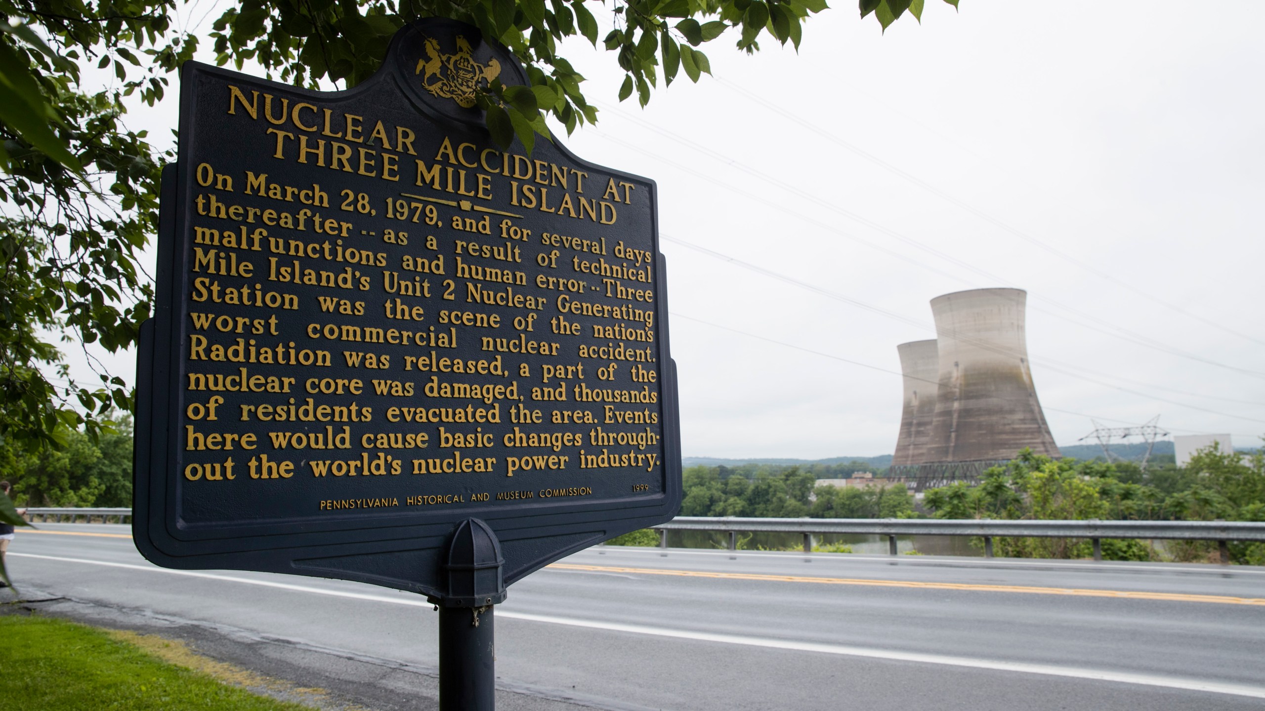 FILE - Shown are the unit 2 cooling towers at the Three Mile Island nuclear power plant in Middletown, Pa., Monday, May 22, 2017. (AP Photo/Matt Rourke, File)