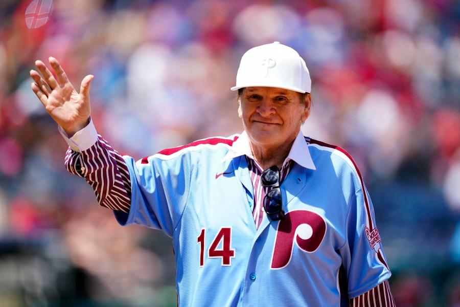 FILE - Former Philadelphia Phillies player Pete Rose tips his hat to fans during an alumni day, Aug. 7, 2022, in Philadelphia. (AP Photo/Matt Rourke, File)