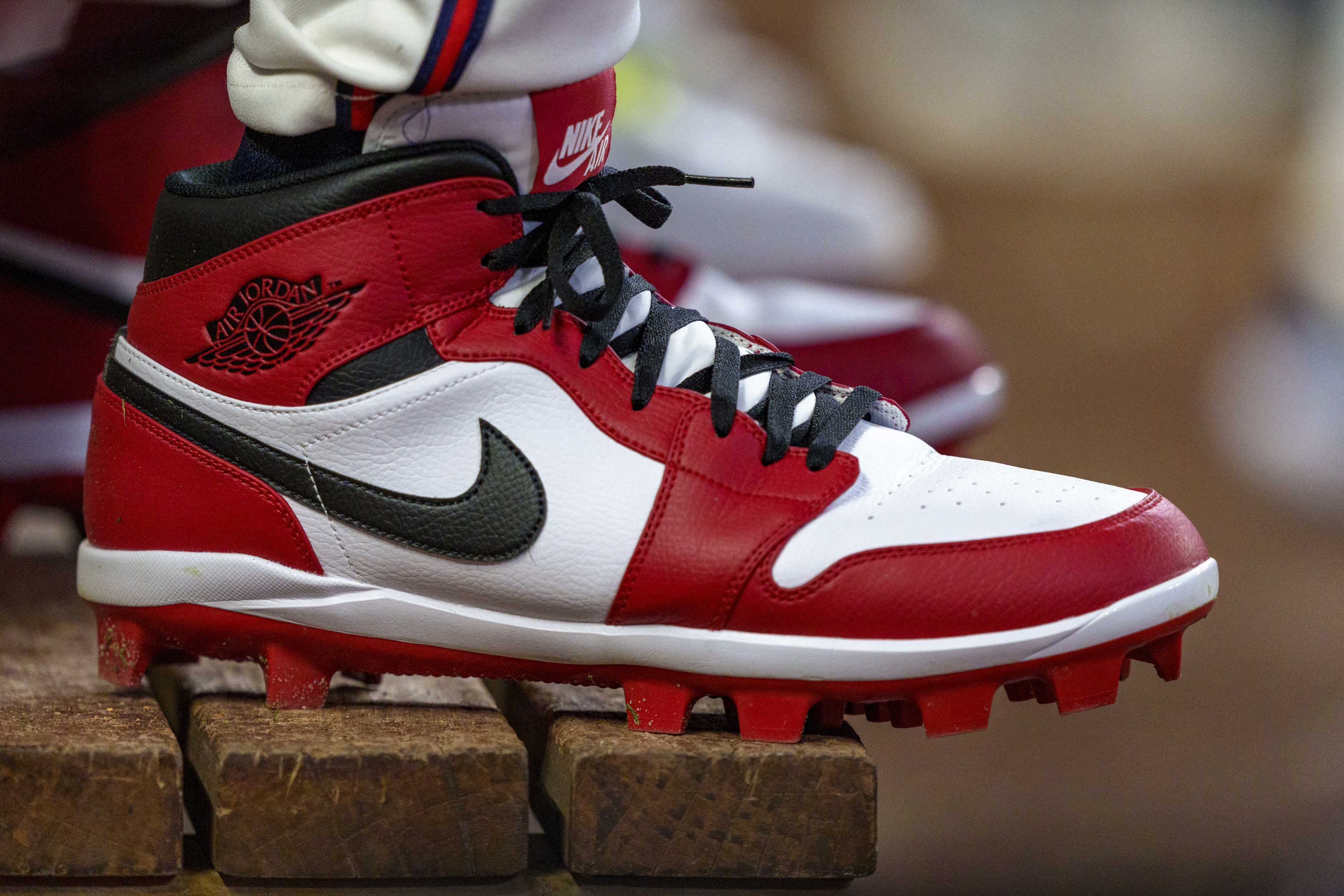 FILE - Atlanta Braves outfielder Jorge Soler wears custom Nike Air Jordan cleats in the dugout during the seventh inning of a baseball game against the Colorado Rockies, Sept. 5, 2024, in Atlanta. (AP Photo/Jason Allen, File)