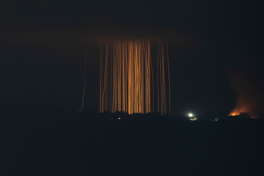 Israeli shelling hit an area in southern Lebanon as seen from northern Israel, Monday, Sept. 30, 2024. (AP Photo/Leo Correa)